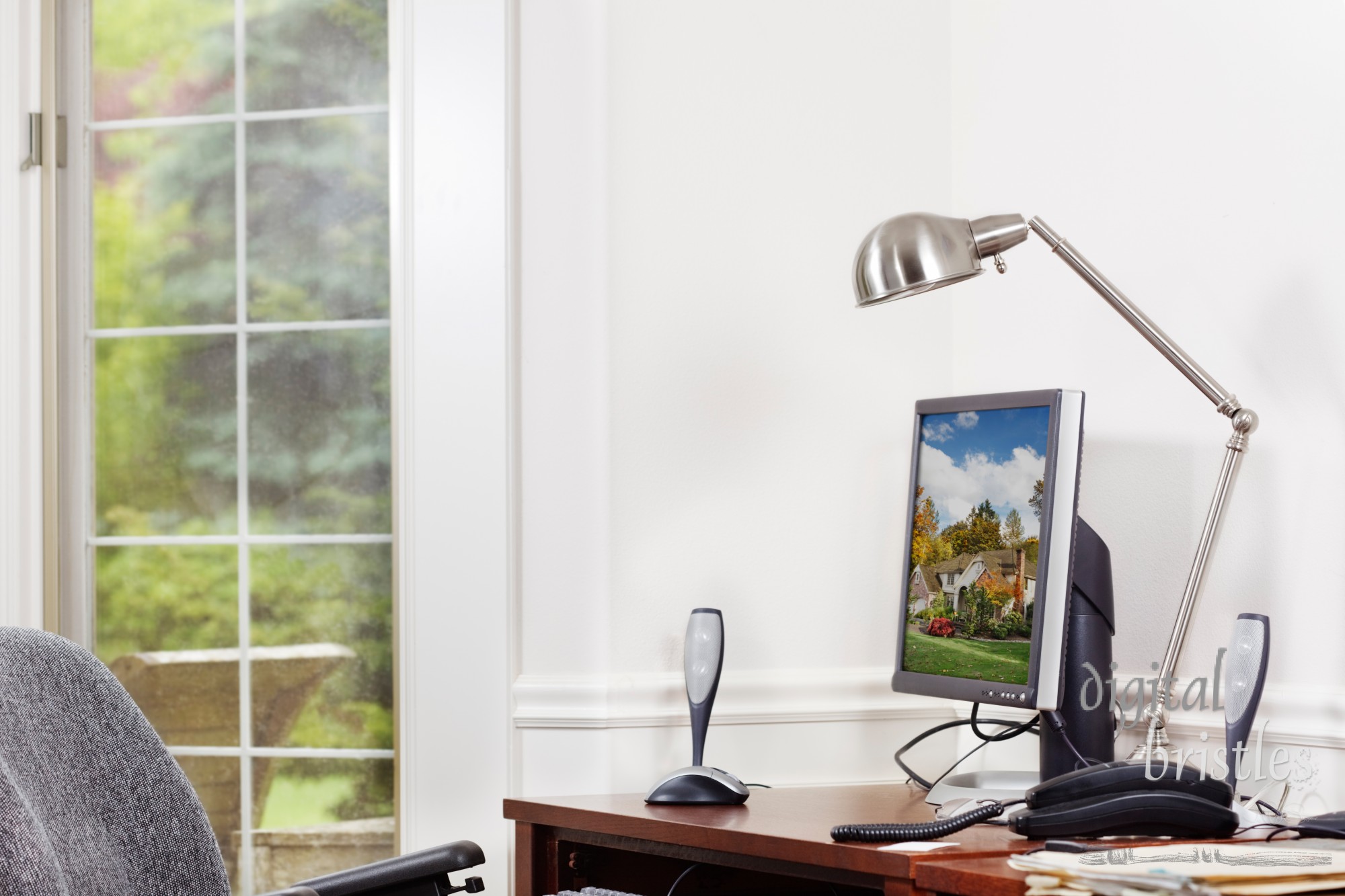 Bright, tidy home office. Clipping path for monitor image.