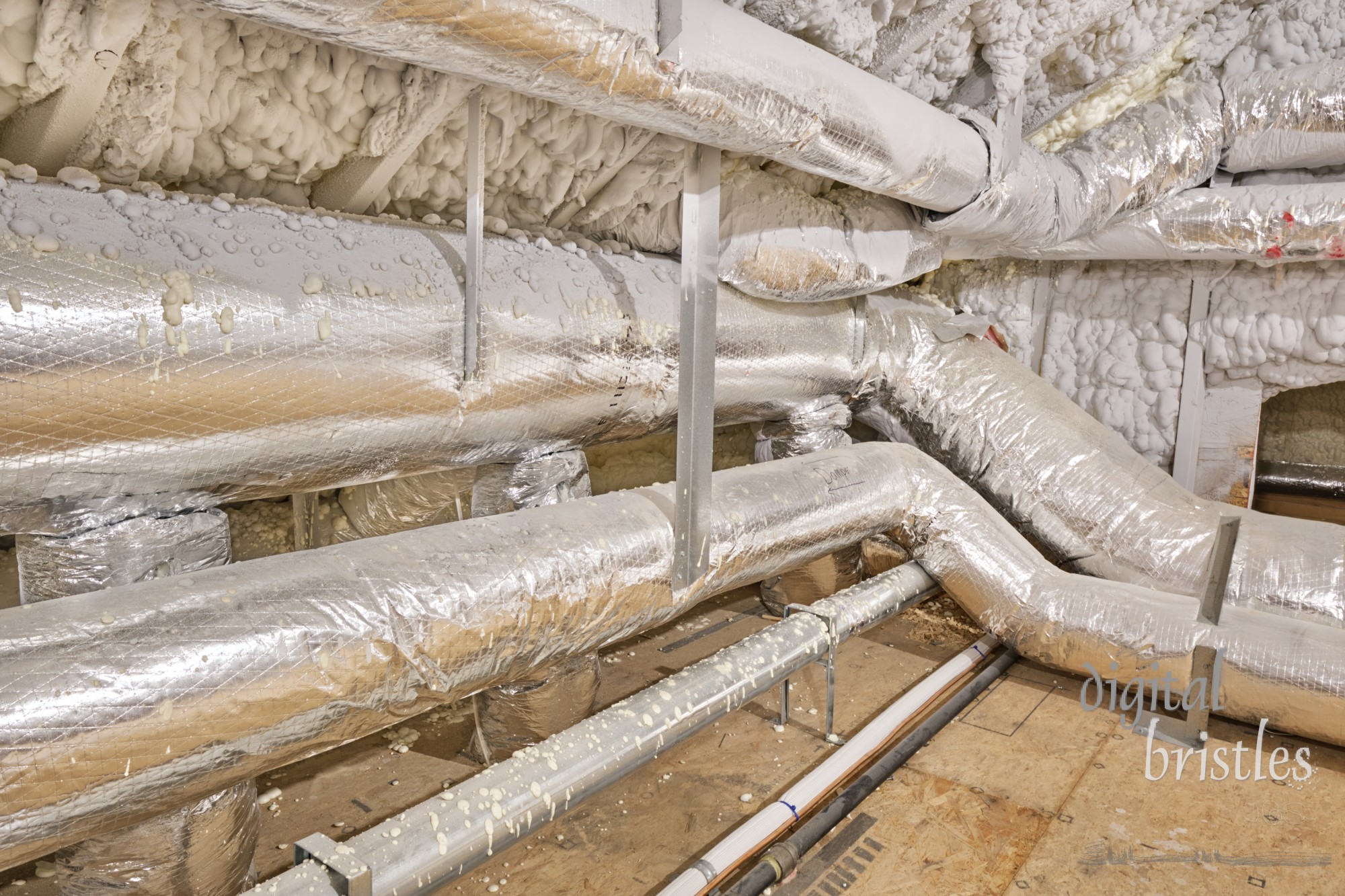 Closed cell foam insulated attic walls and flexible insulated ducts for heating and air conditioning