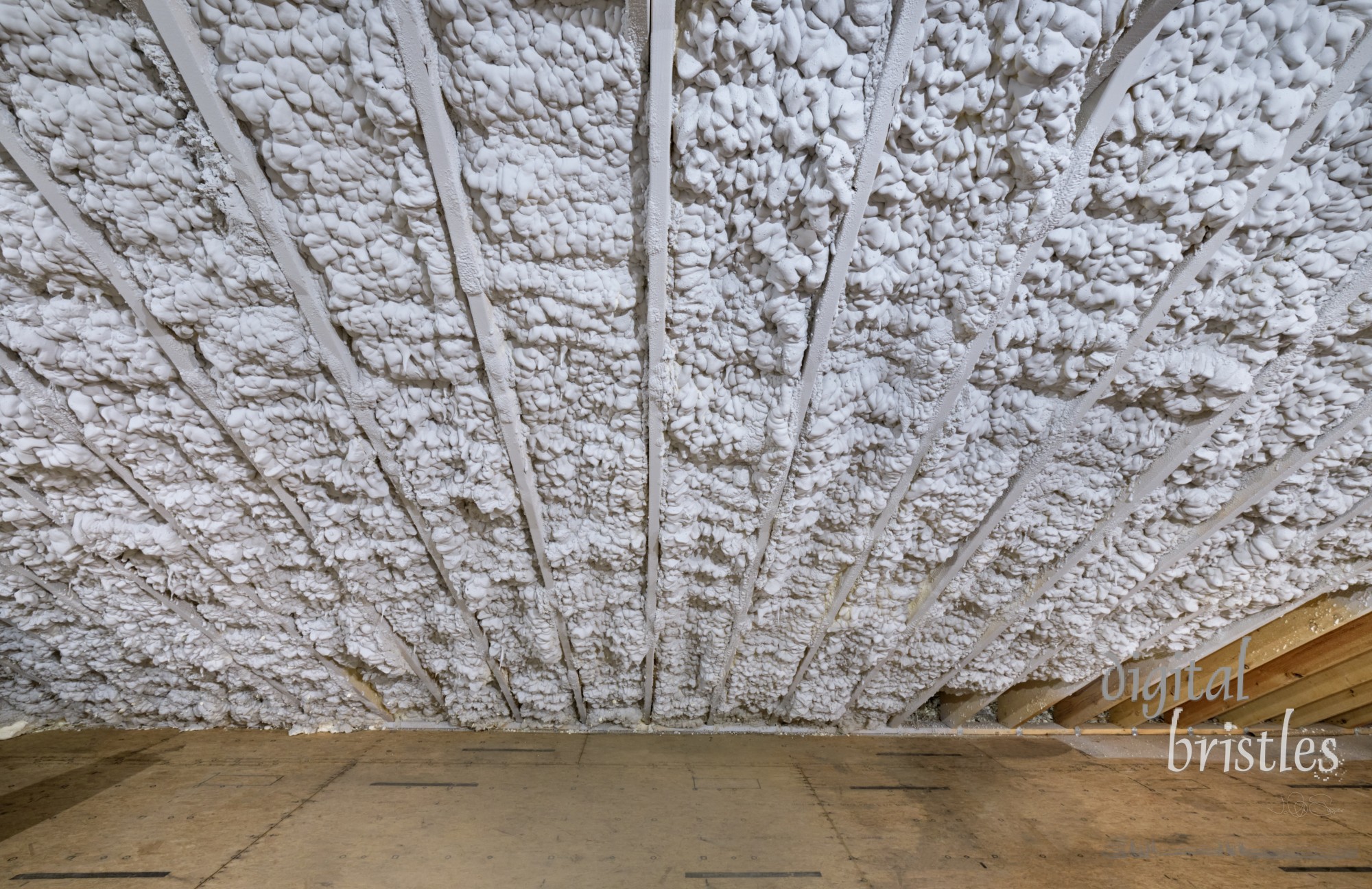 Closed cell foam insulation in an unfinished attic