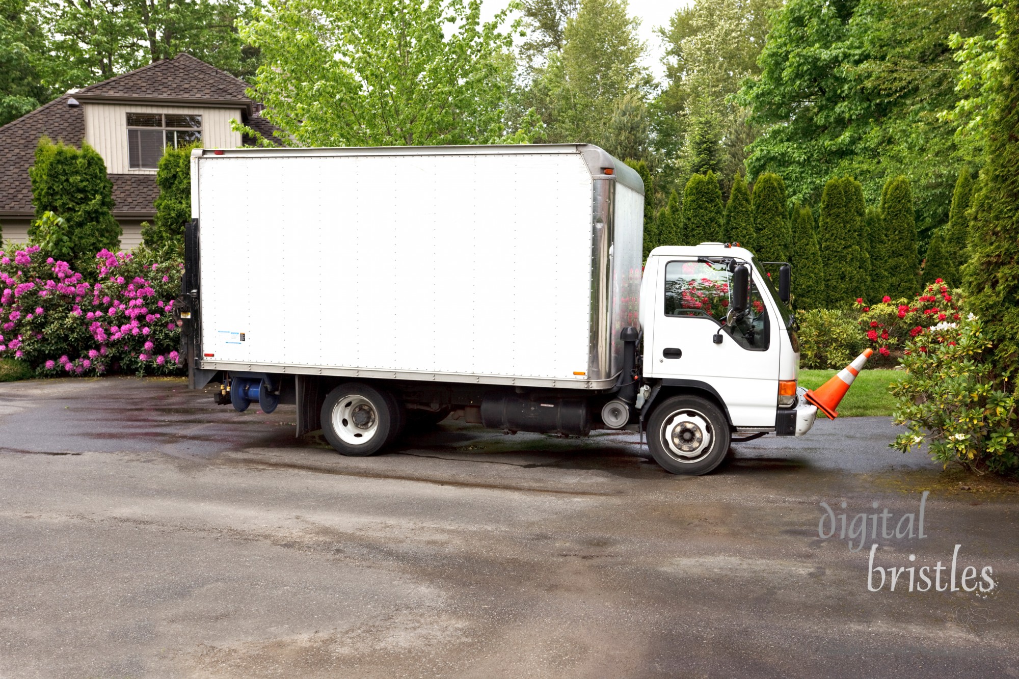 Worker's truck parked in a home's driveway