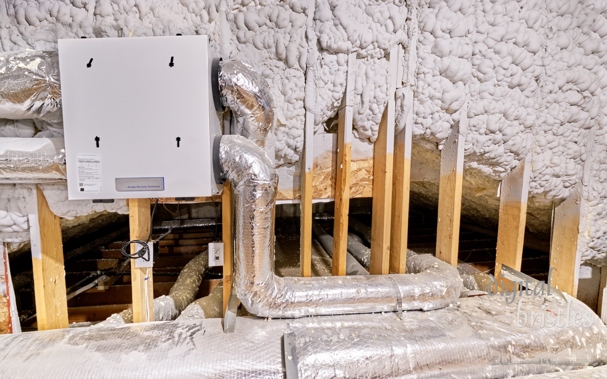 Energy Recovery Ventilator is connected to insulated ductwork to manage heating or cooling incoming fresh air