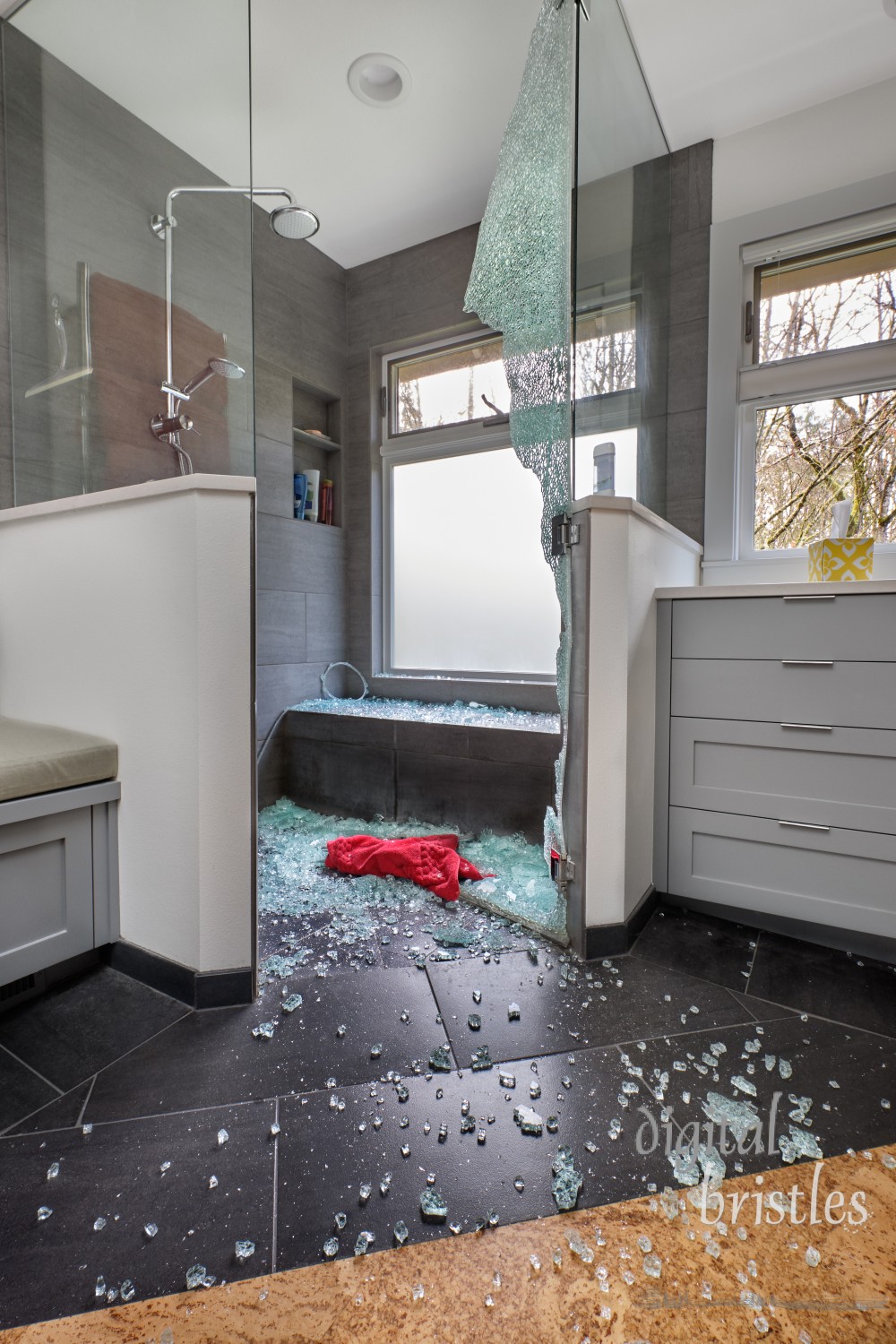 Tempered glass shower door spontaneously exploded scattering glass all over the bathroom