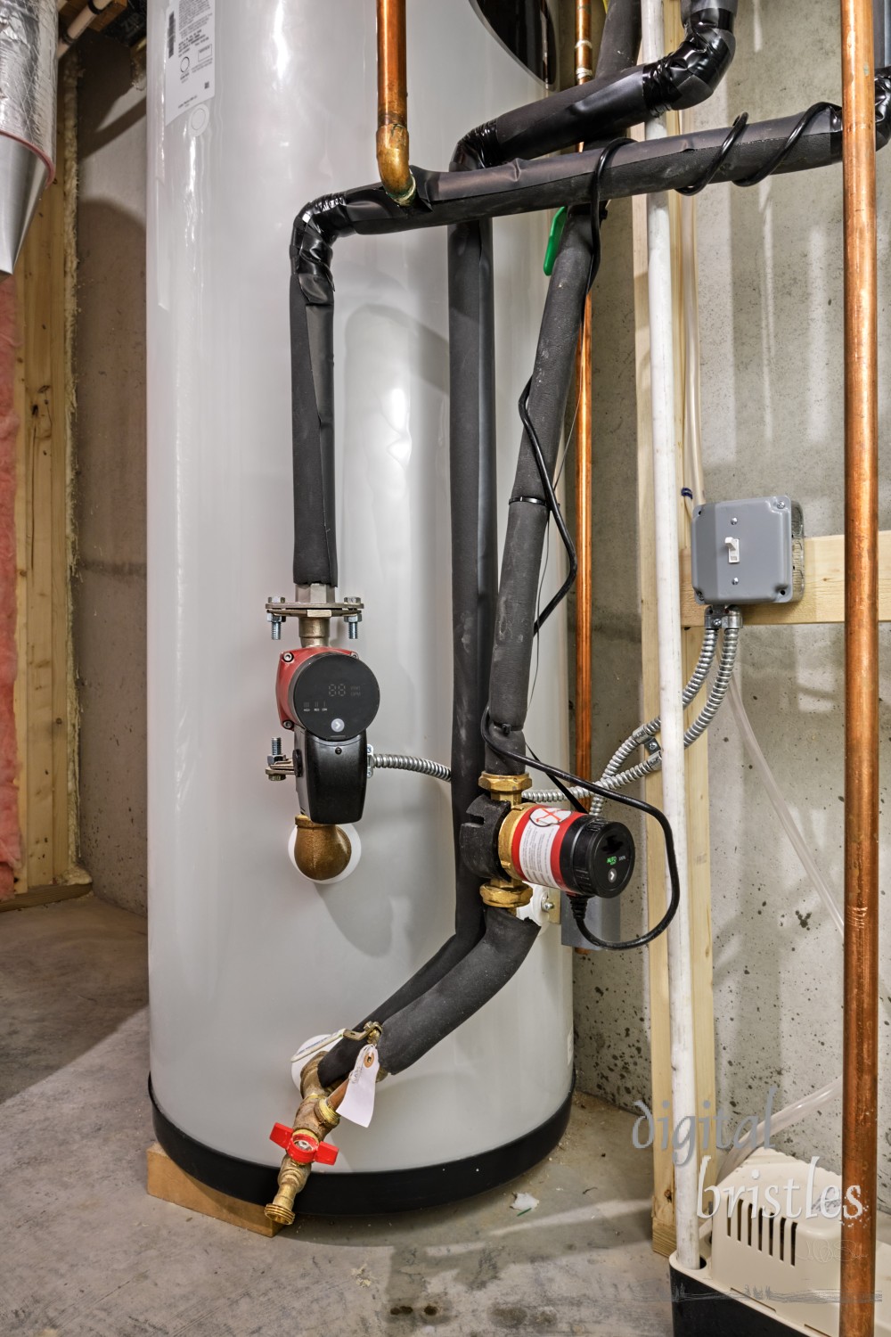 Plumbing and wiring for a pump-driven recirculation system on a home's hot water pipes