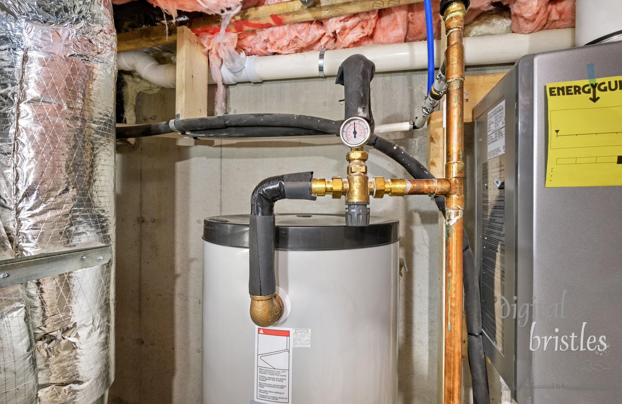 Thermostatic mixing valve regulating temperature for home's hot water to a safe level