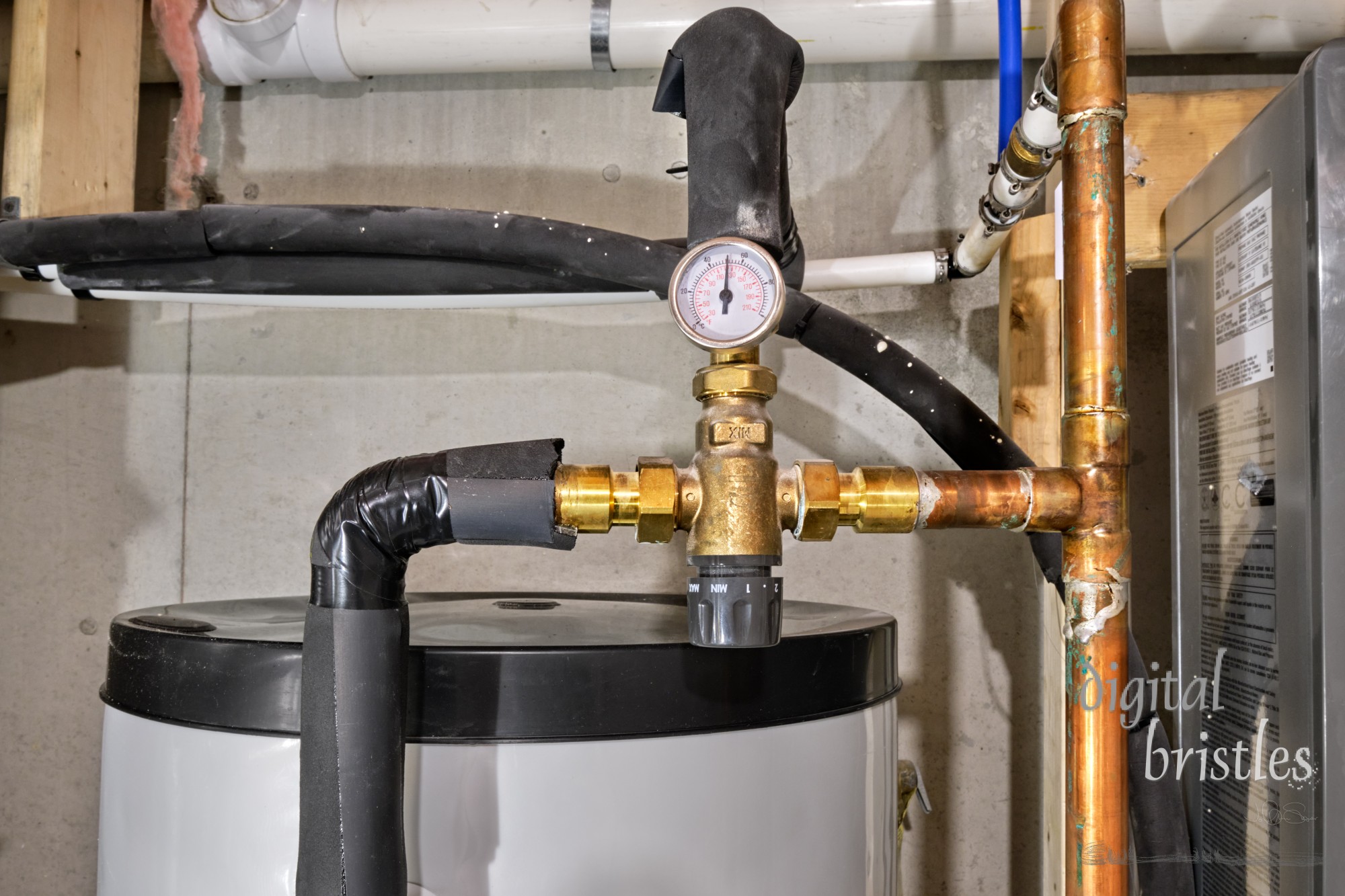 Input, output and temperature gague for tankless hot water heater and storage