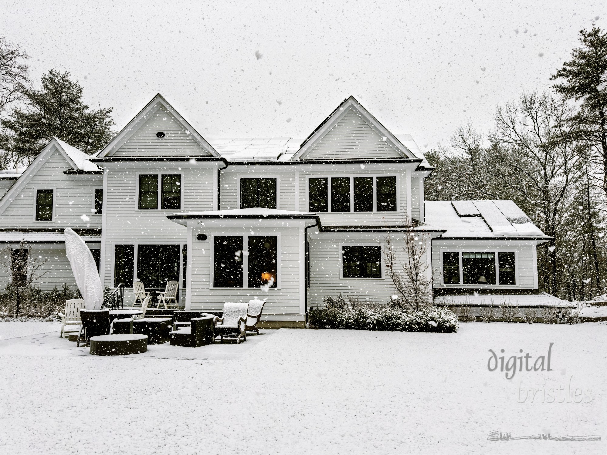 Rooftop solar panels coated in snow in a late Autumn snow storm