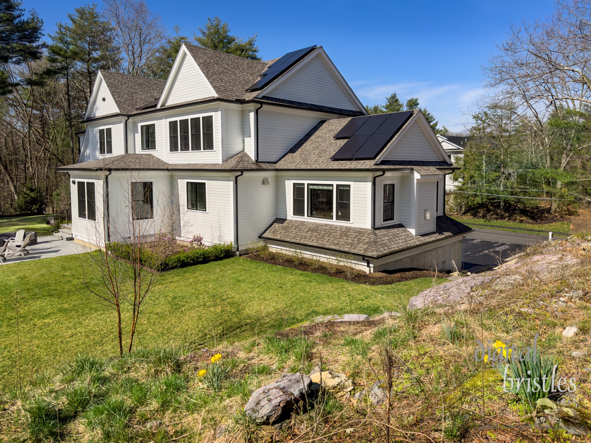 Solar panels on rear roof of suburban house