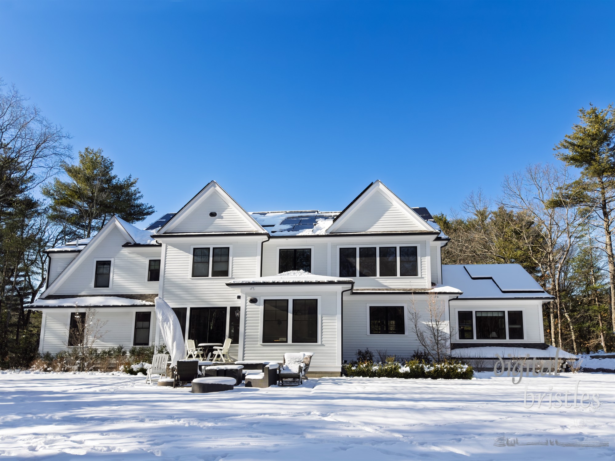 Days after the snowstorm, rooftop solar panels finally begin to clear so they can produce energy