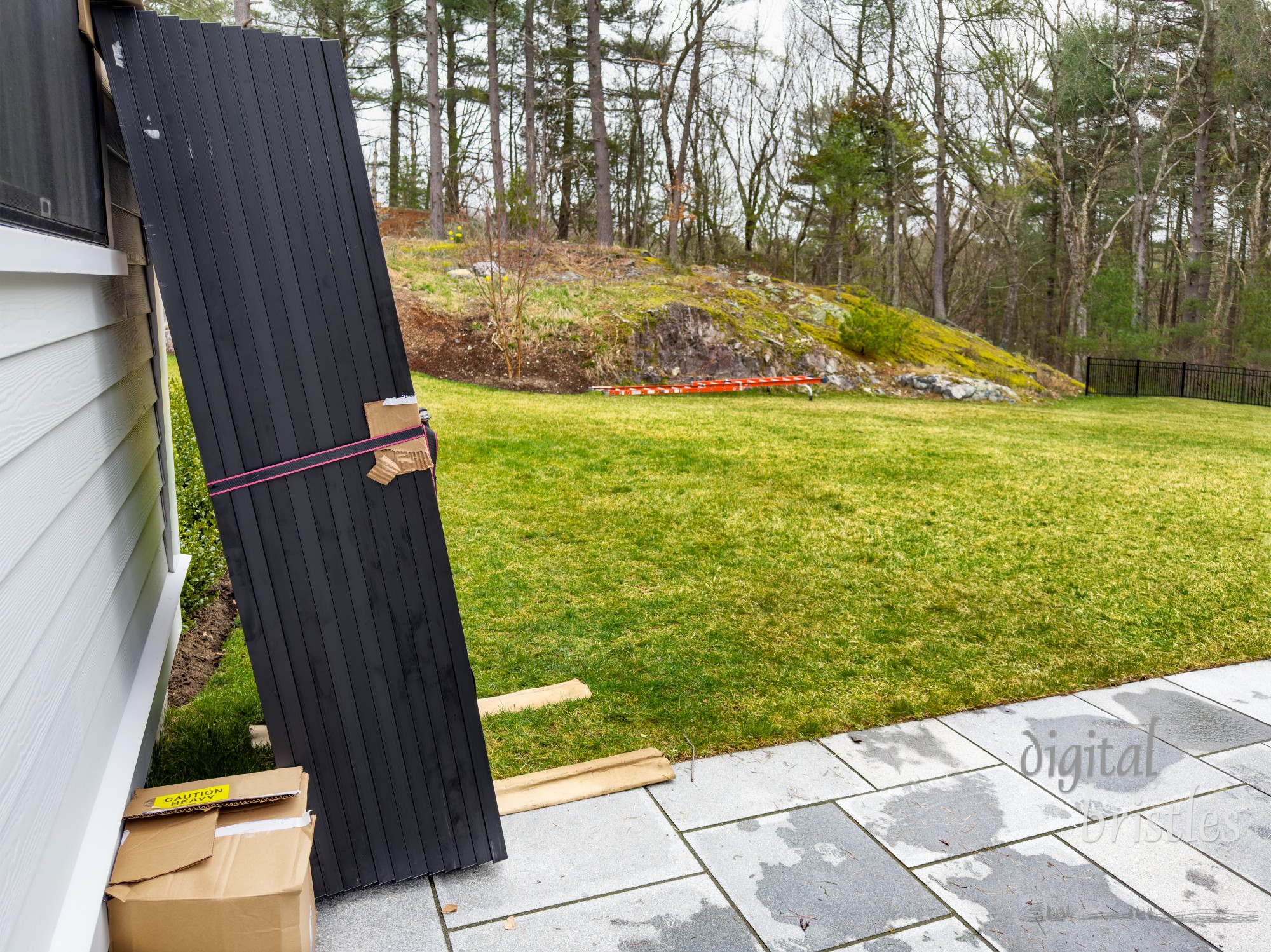 Solar panels waiting to be installed on the home's roof