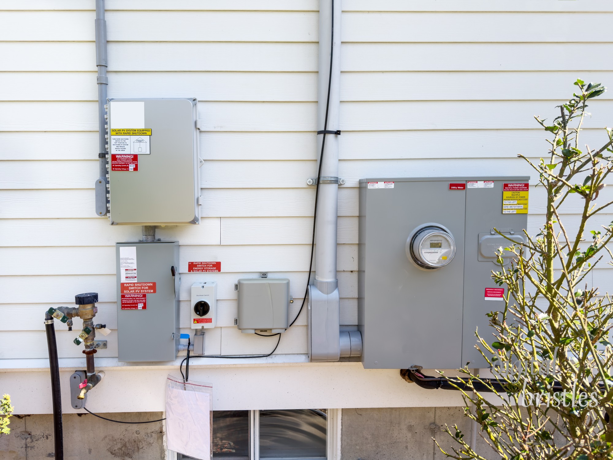 Home electrical meter and solar panel interconnection panel with emergency disconnect