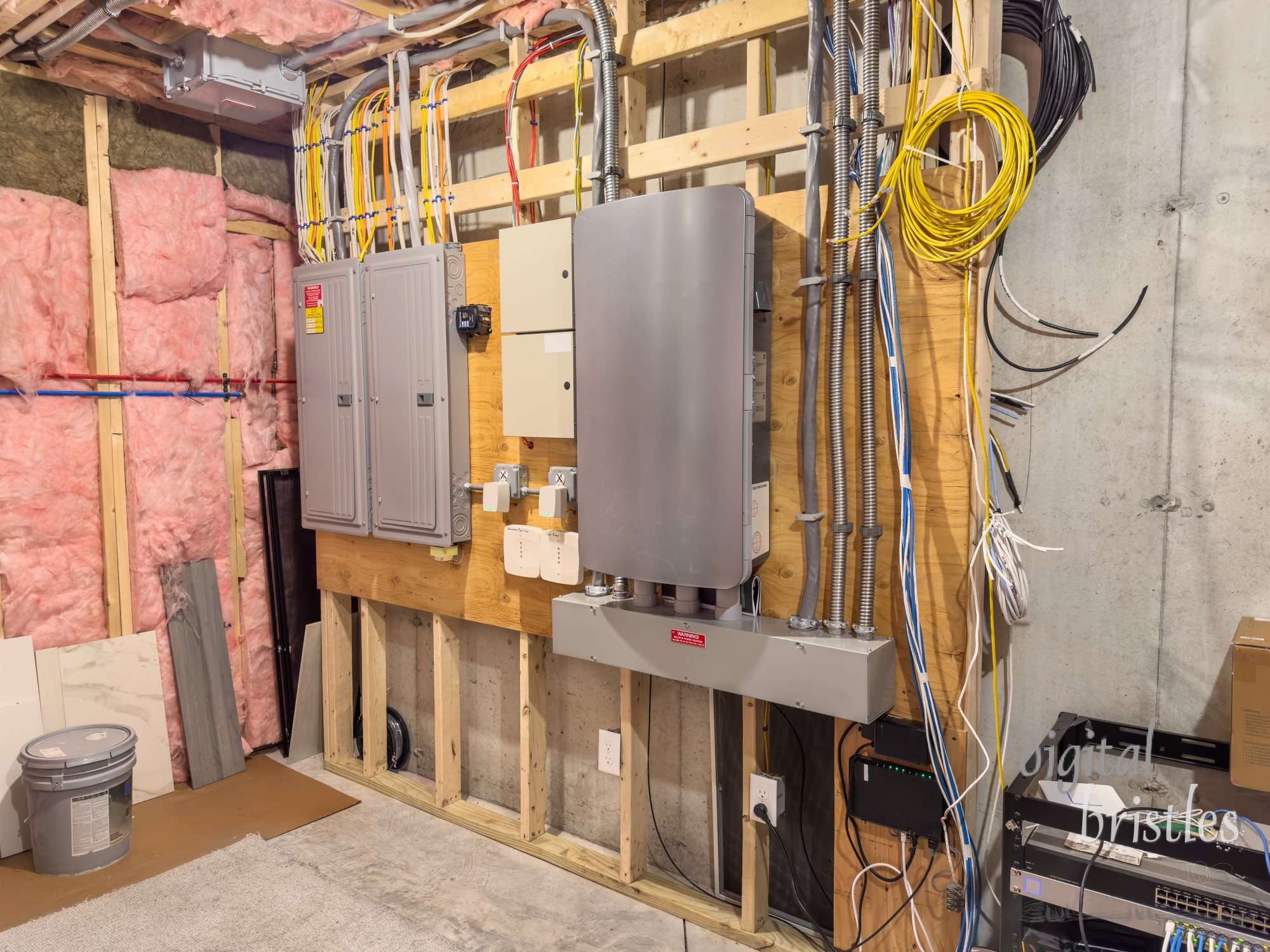 Upgraded basement utility room connected to rooftop solar panels and battery storage