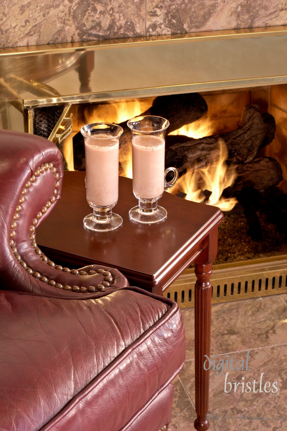 Burgundy leather chair by the fireside