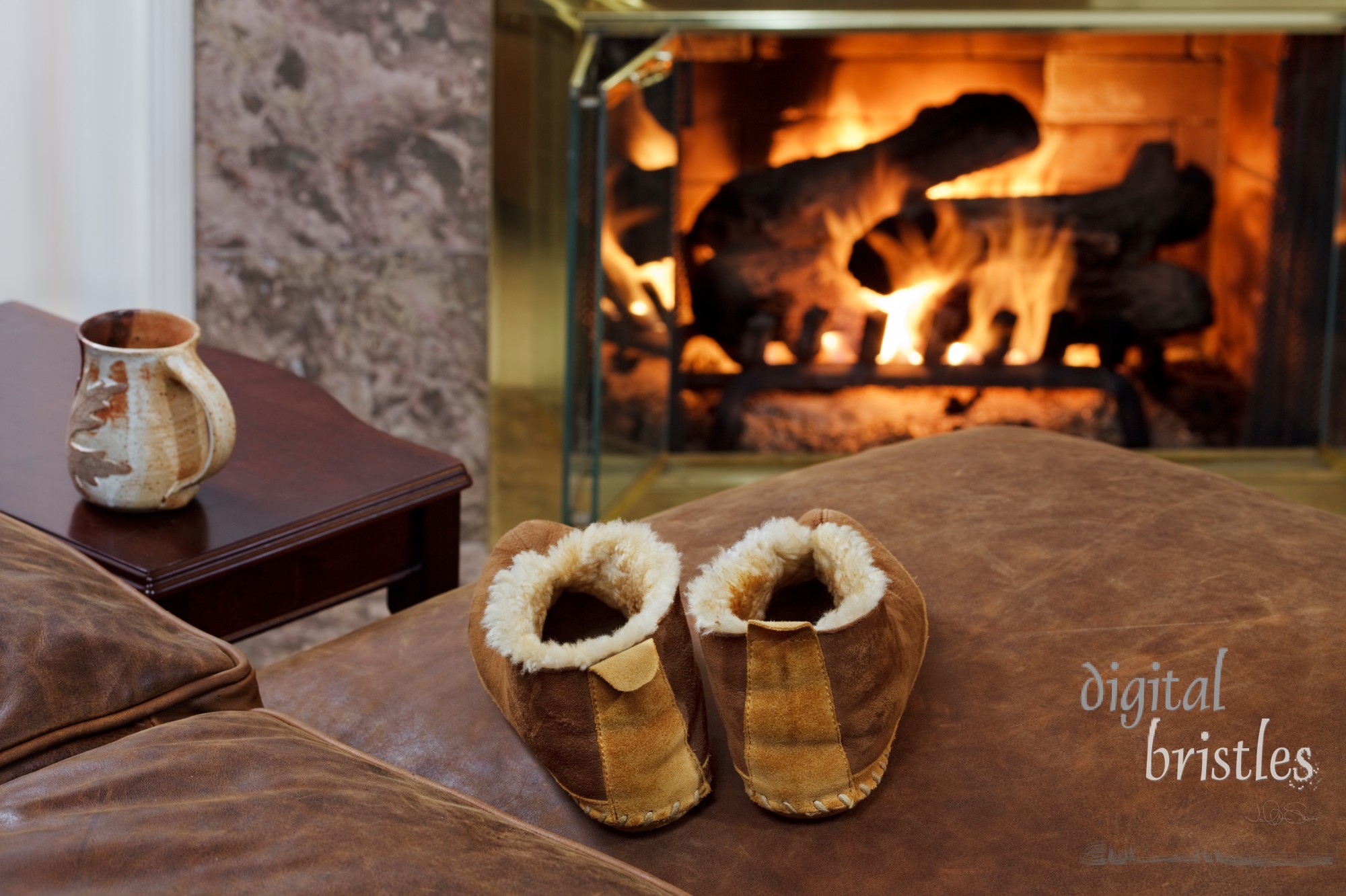 Coffee mug & slippers by the fire