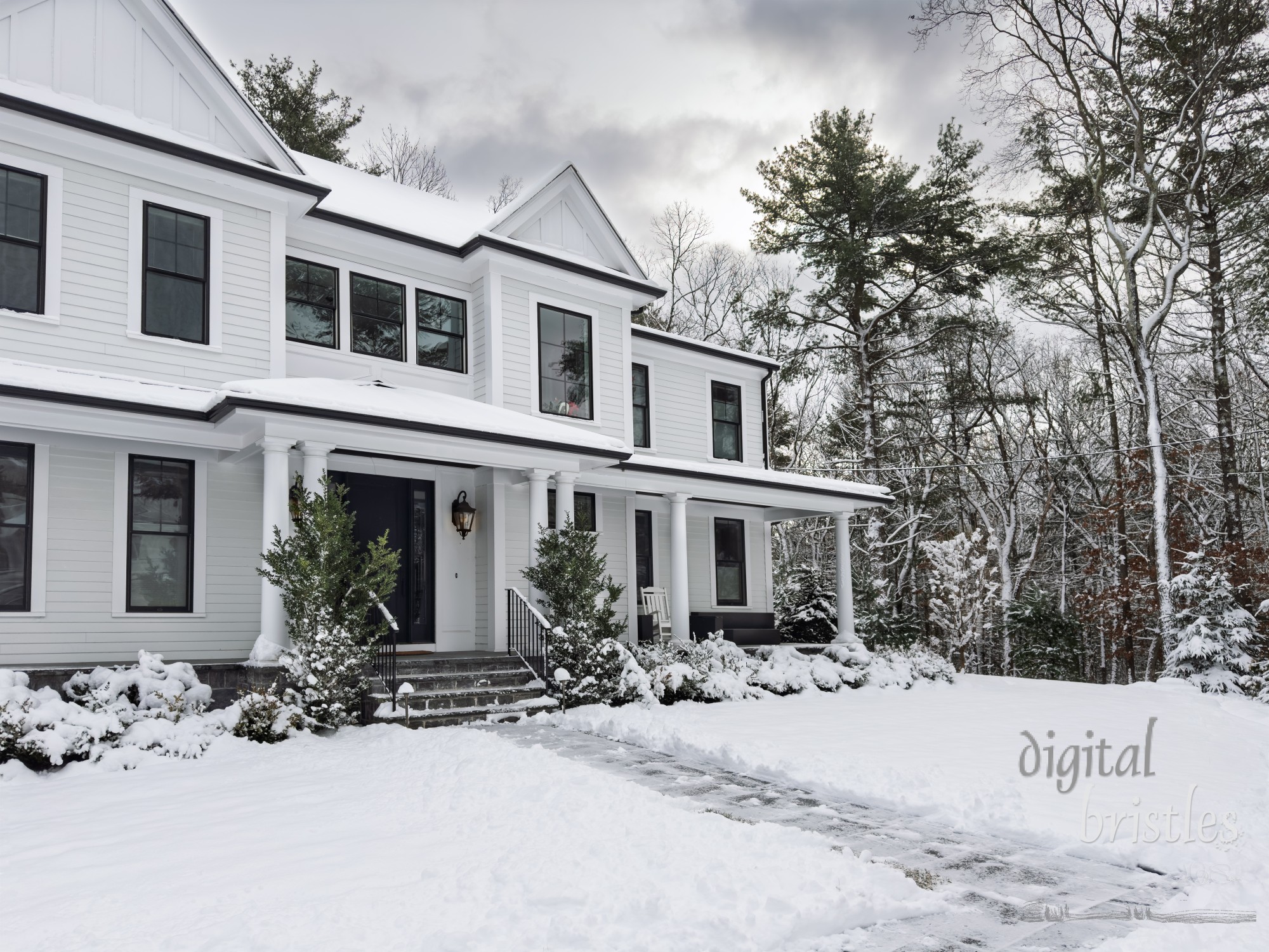 Walkway and steps shoveled after an early winter snowstorm