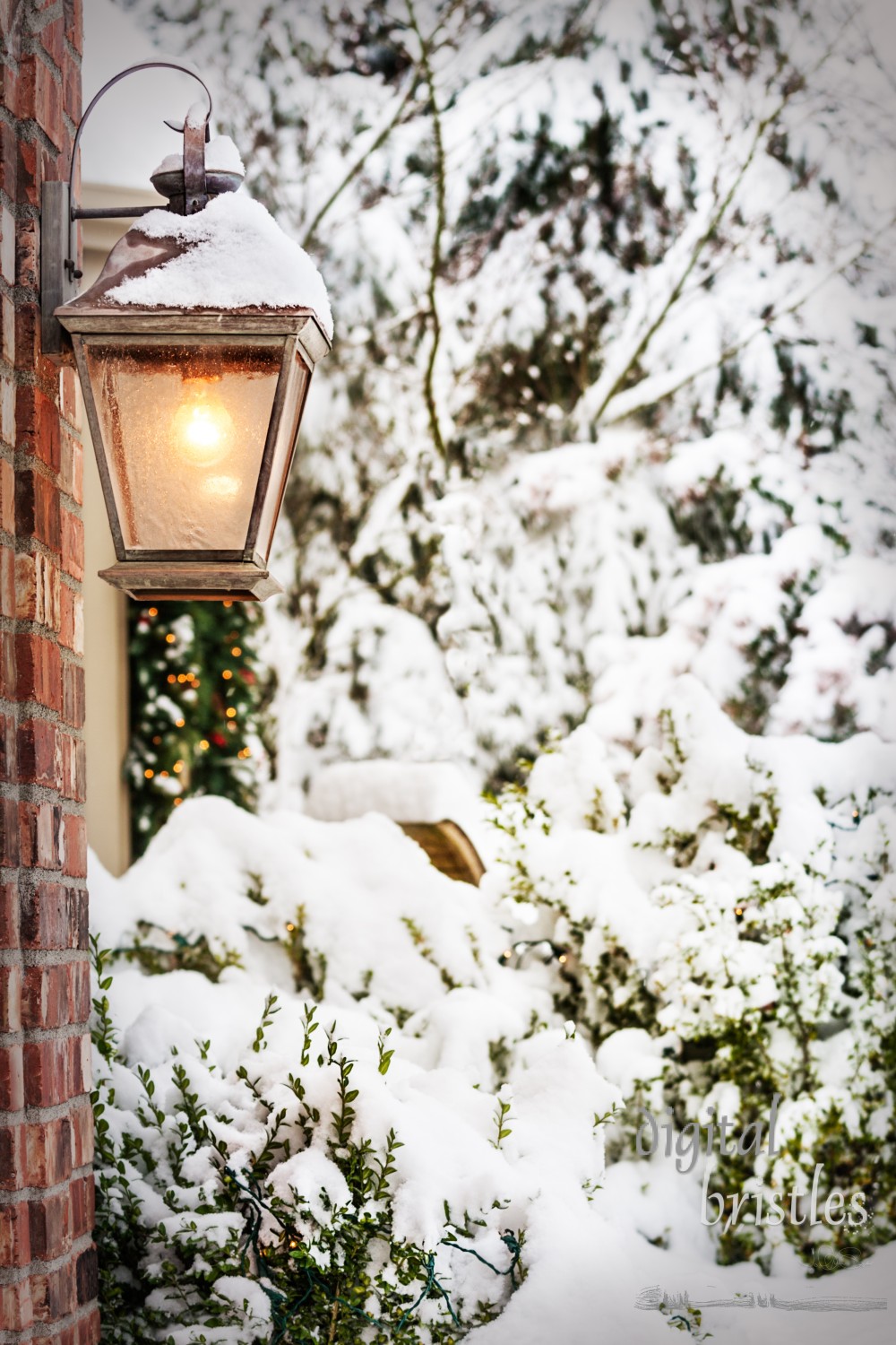 Home decorated for Chrismas with lights snowed in 