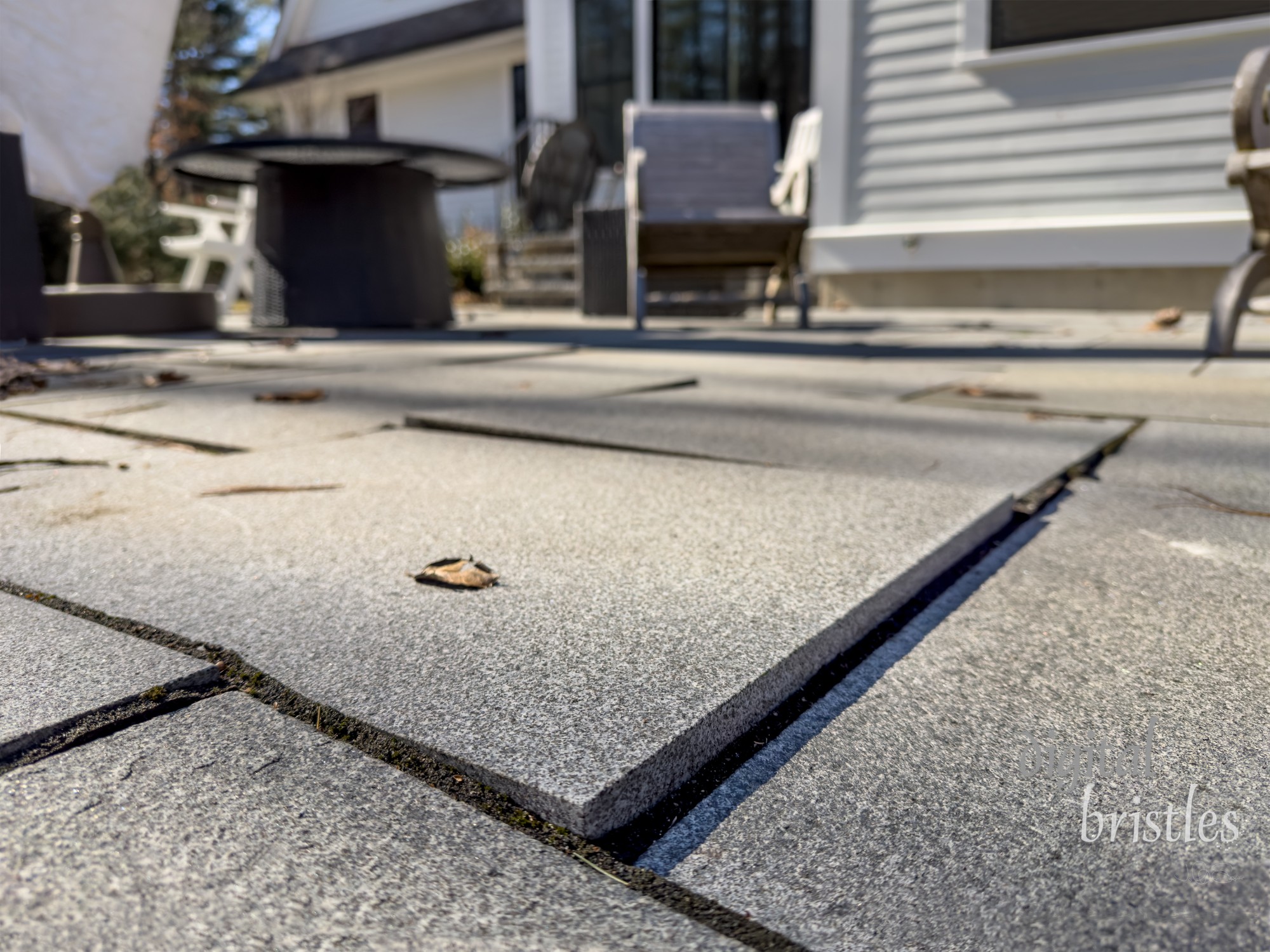 Winter patio becomes uneven as pavers lift with frost heaves in freezing weather