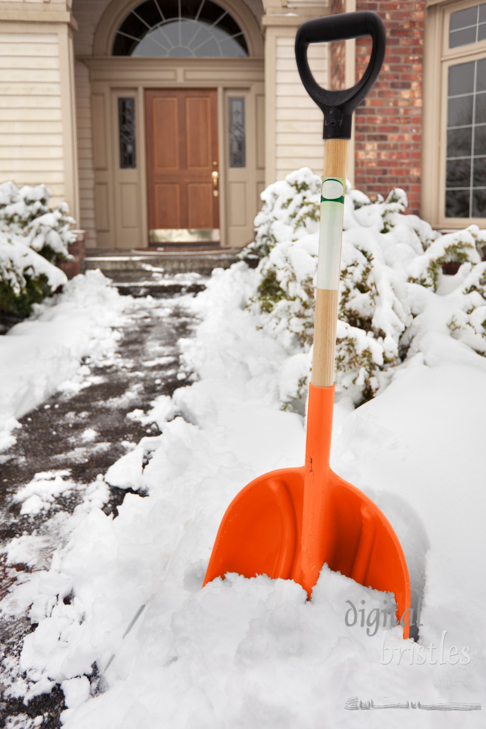 Clearing path to the front door after a big snowstorm