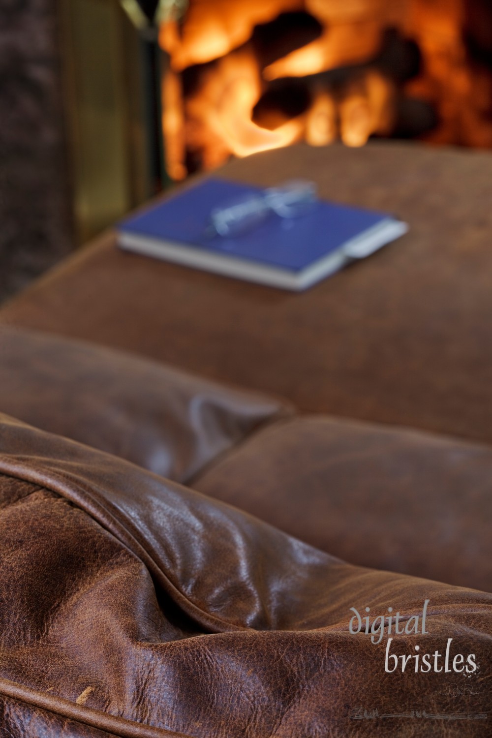 Comfortable leather sofa to read by the fire