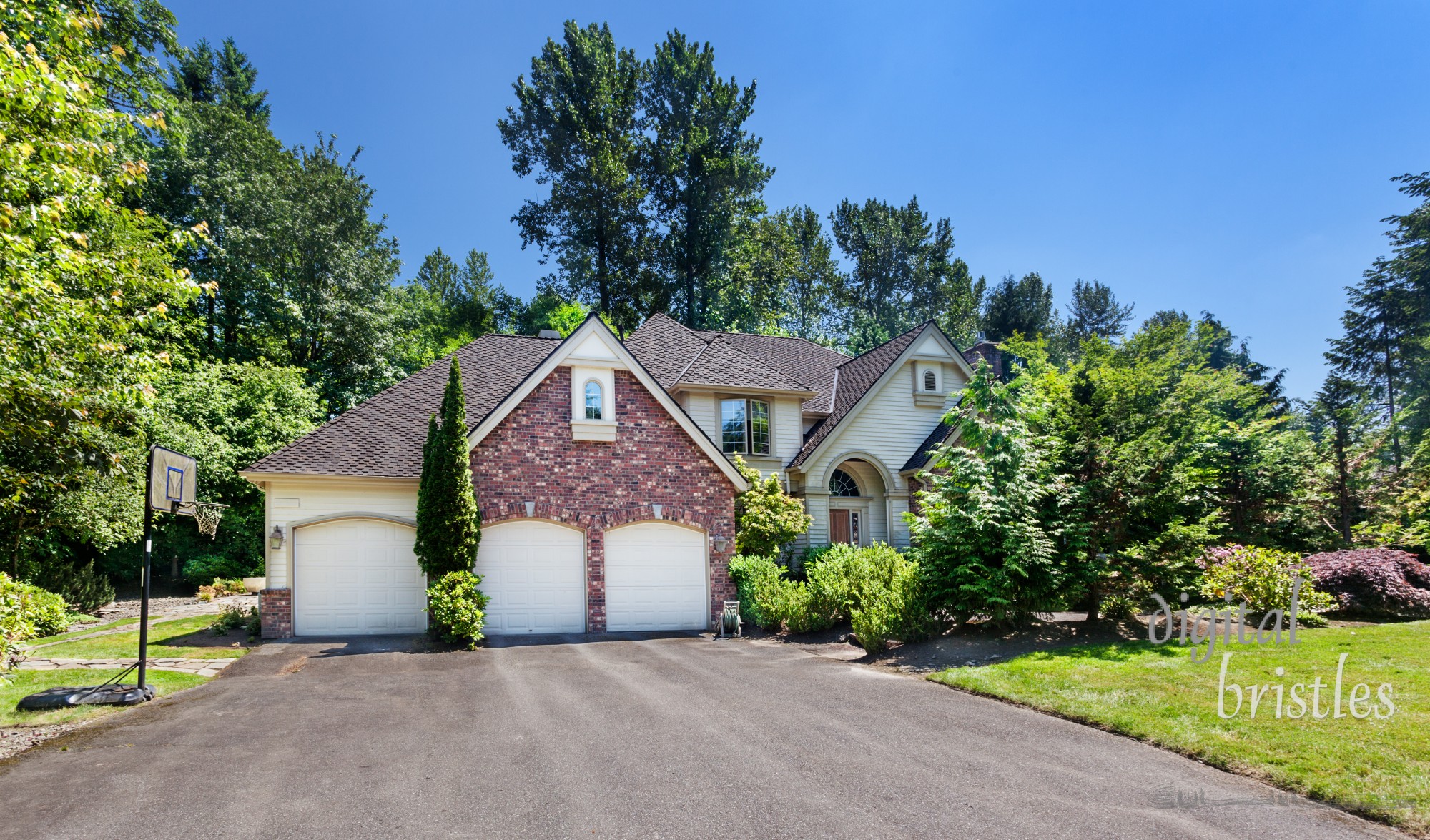 20 year old suburban home with a newly finished composition tile roof