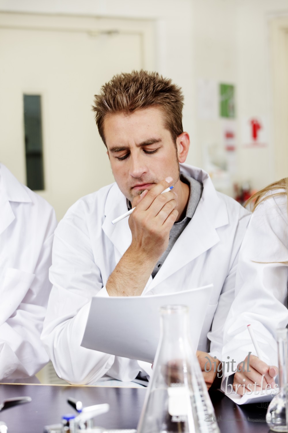 Trainee looks at his notes, trying to make sense of them