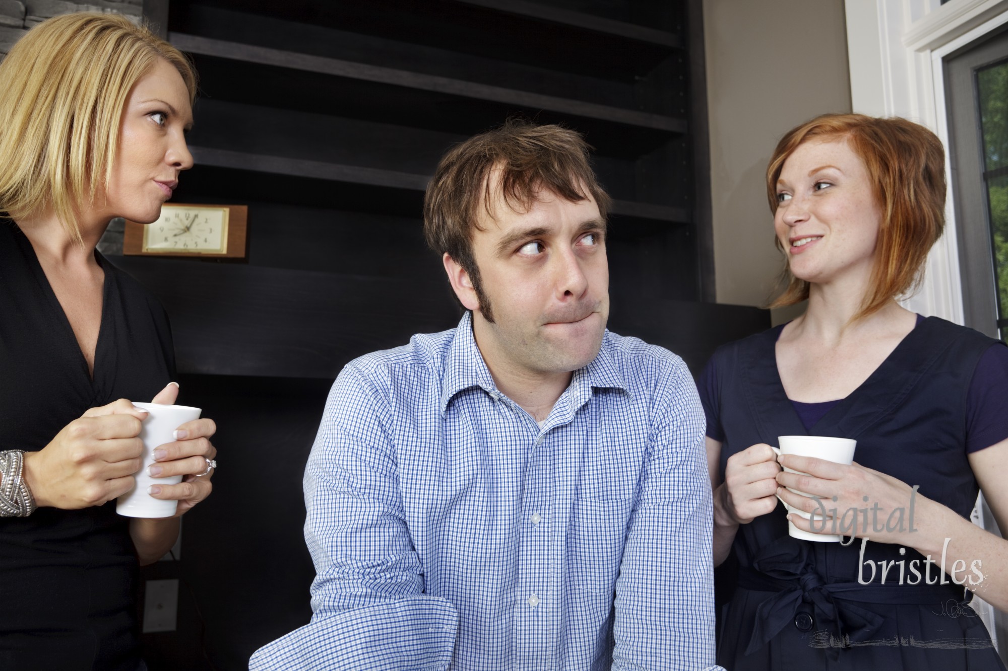 Man is convinced the two women are talking about him, and that he's in trouble!