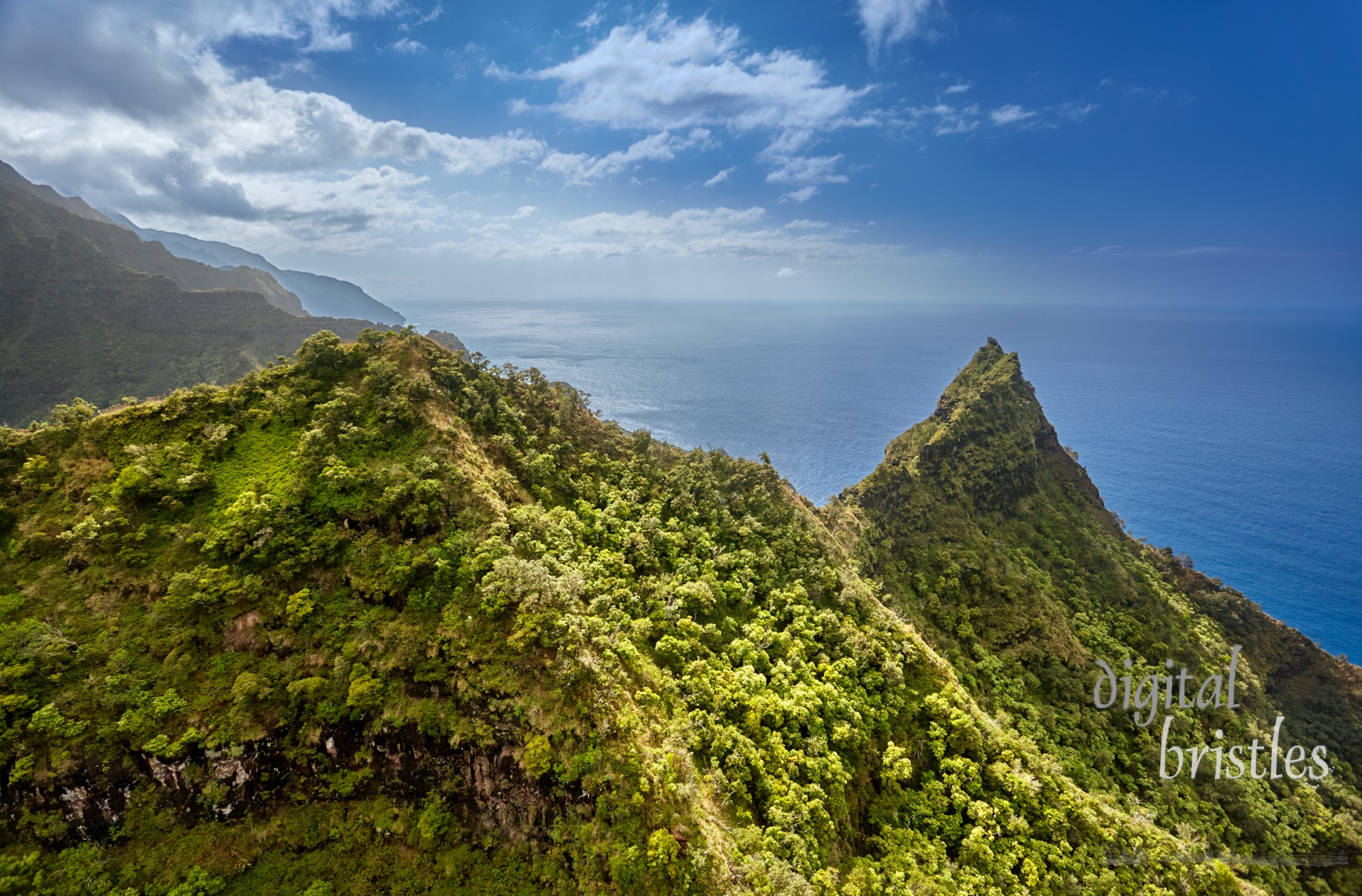 Flying around the rugged tops of the cliffs along the Na Pali coast, Kauai, Hawaii