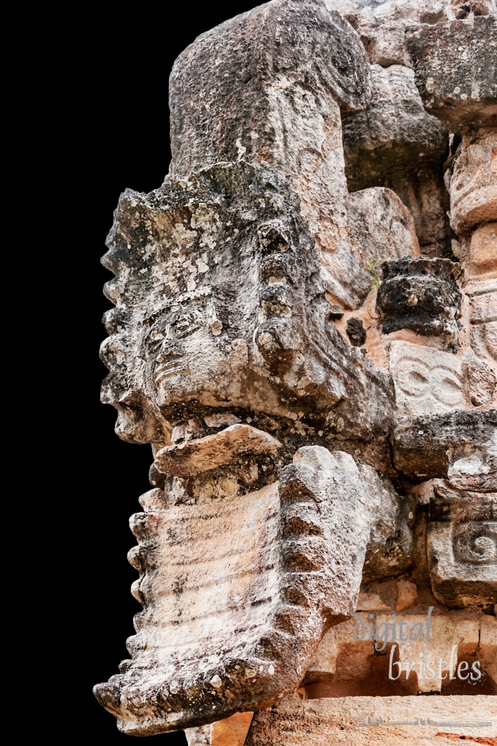 Kukulkan, the serpent god, with a human warrior's head prodruding from his open jaws, Palace, Labna, Mexico