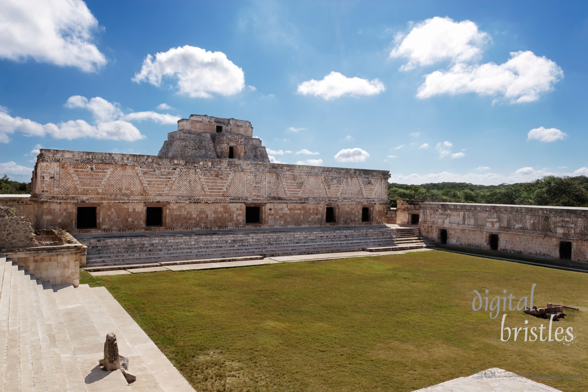 The Magician's Pyramid rises behind the Nunnery Quadrangle, Uxmal, Mexico