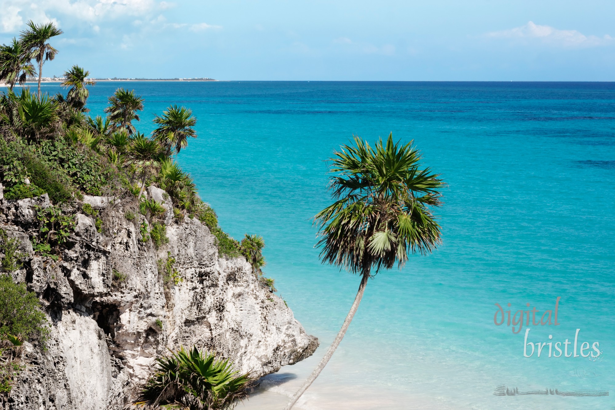 Beach below the cliffs of Tulum, Mexico