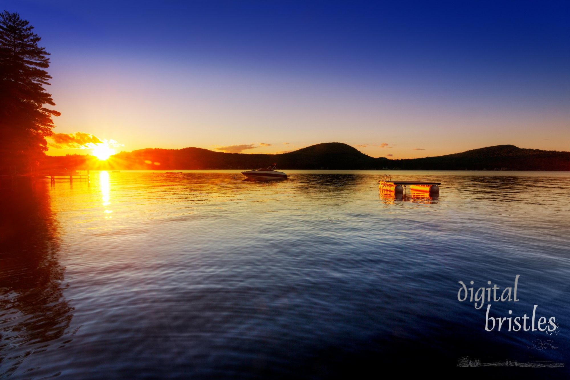 Rich colors of a Summer sunset at a new Hampshire lake