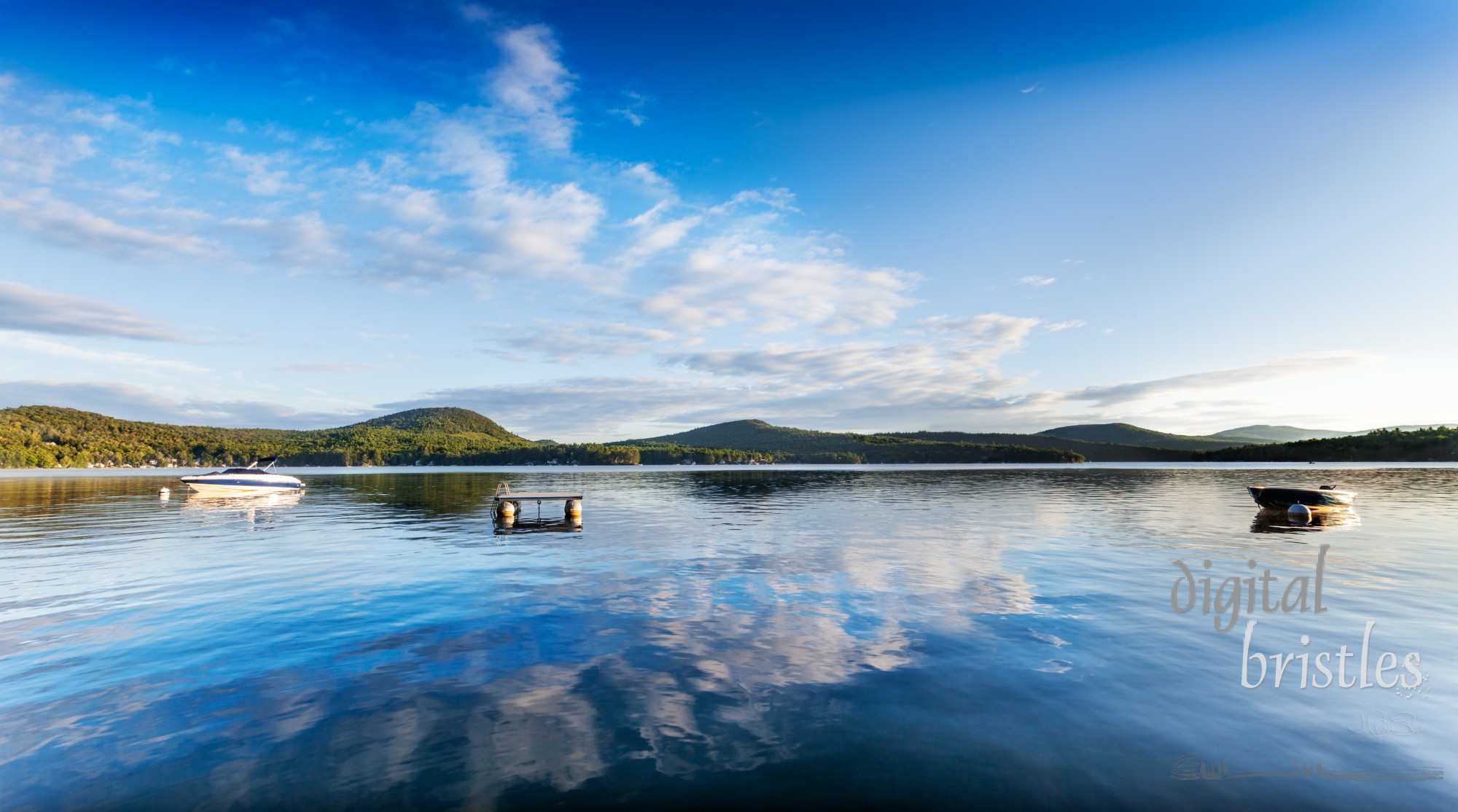 Panorama of a calm summer morning on Merrymeeting Lake, New Hampshire