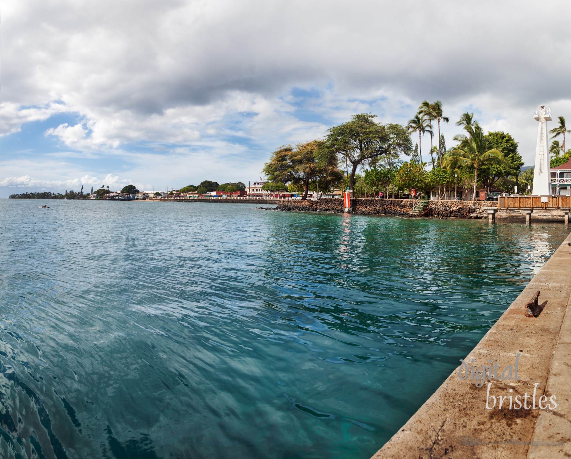 Front Street, Lahina, Maui up to the jetty with the 1917 Lahaina Harbor Light