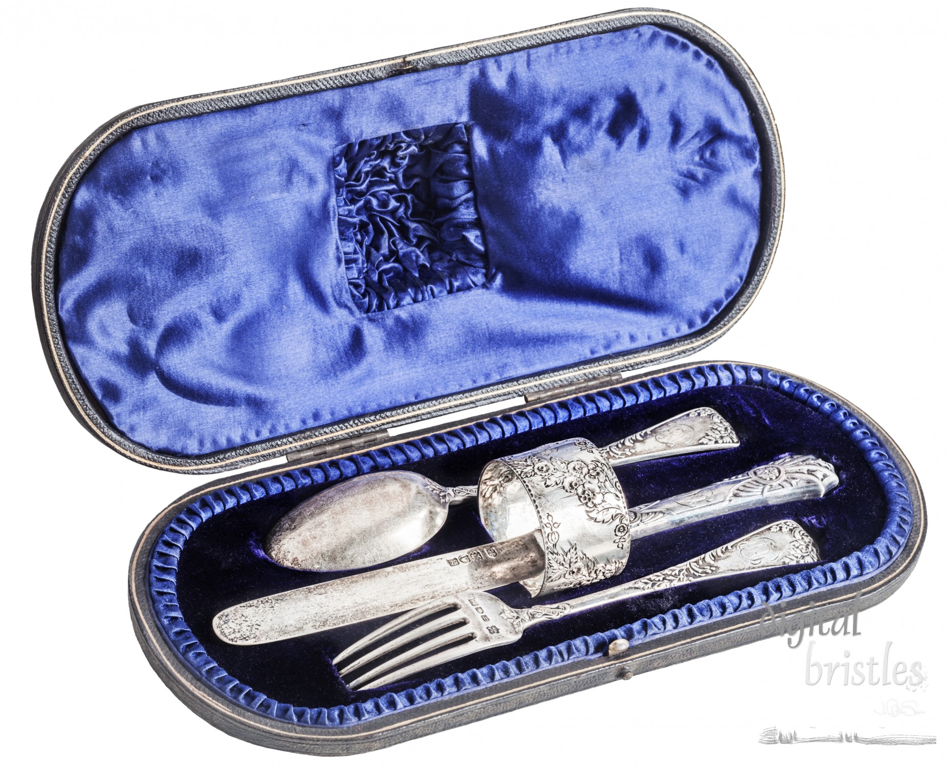 Engraved silver place setting in velvet and satin box