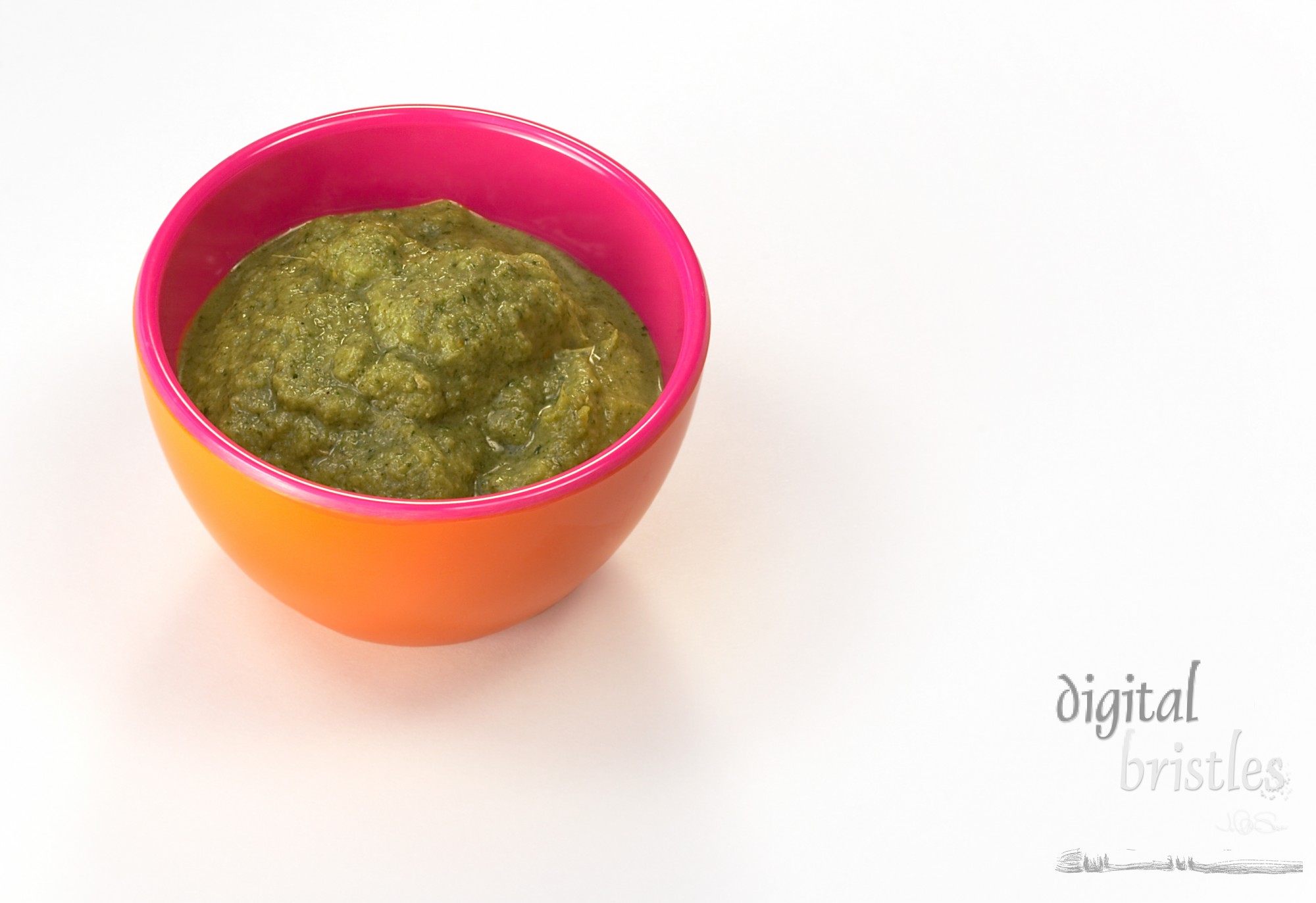 Cilantro sauce in small bowl - with clipping path