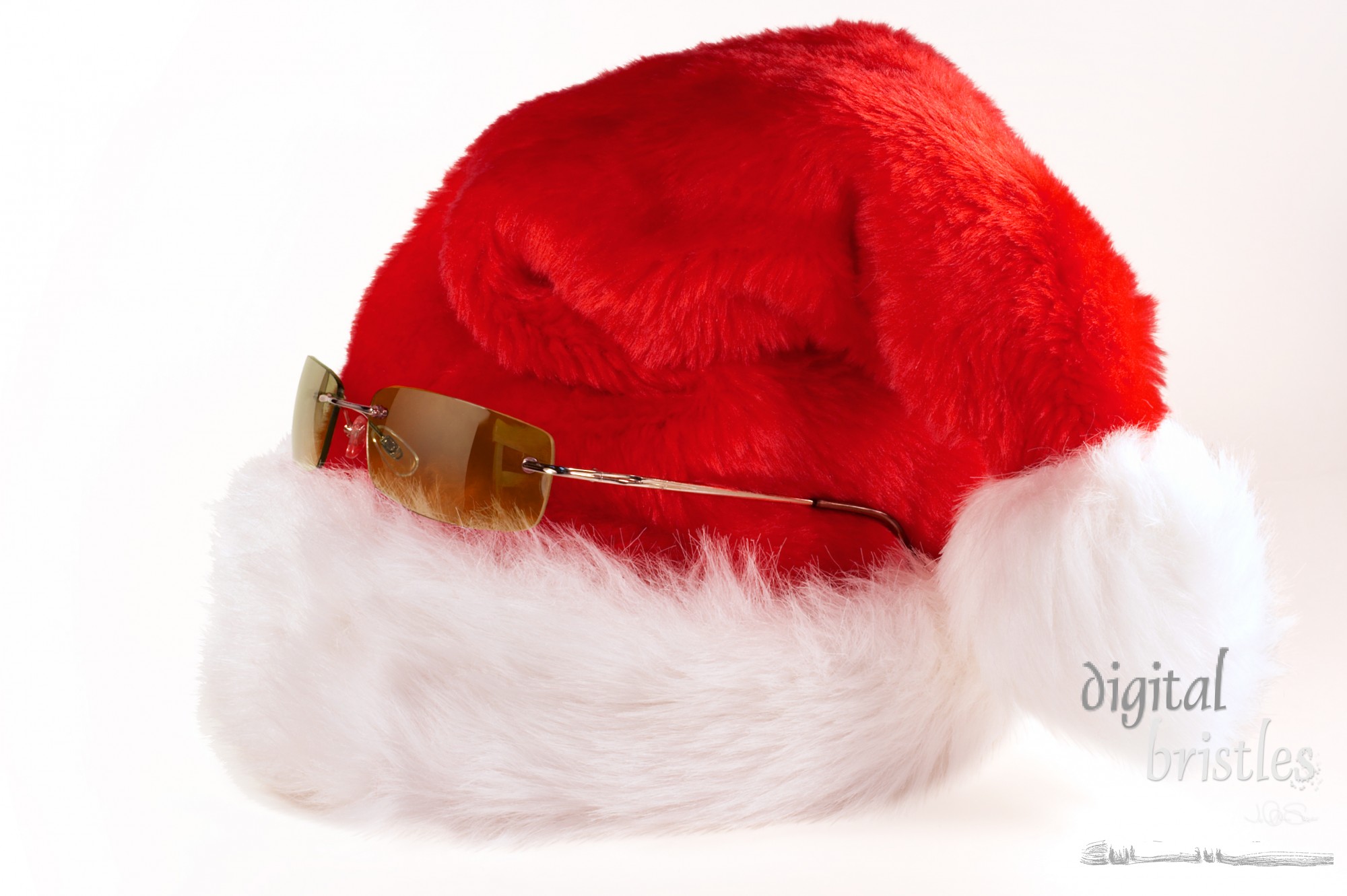 Cool dude shades resting on Santa hat