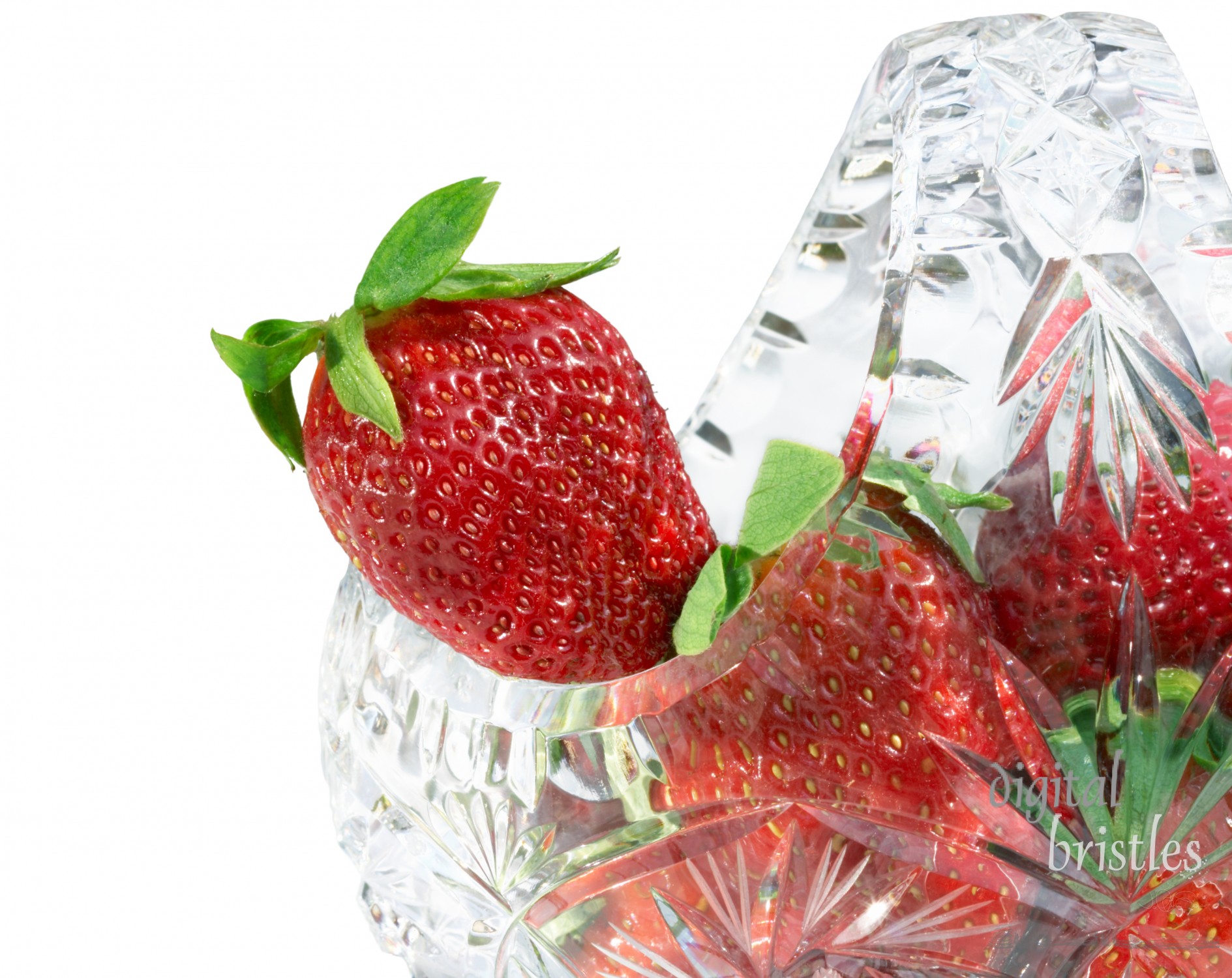 Fresh strawberries in a cut crystal basket, horizontal
