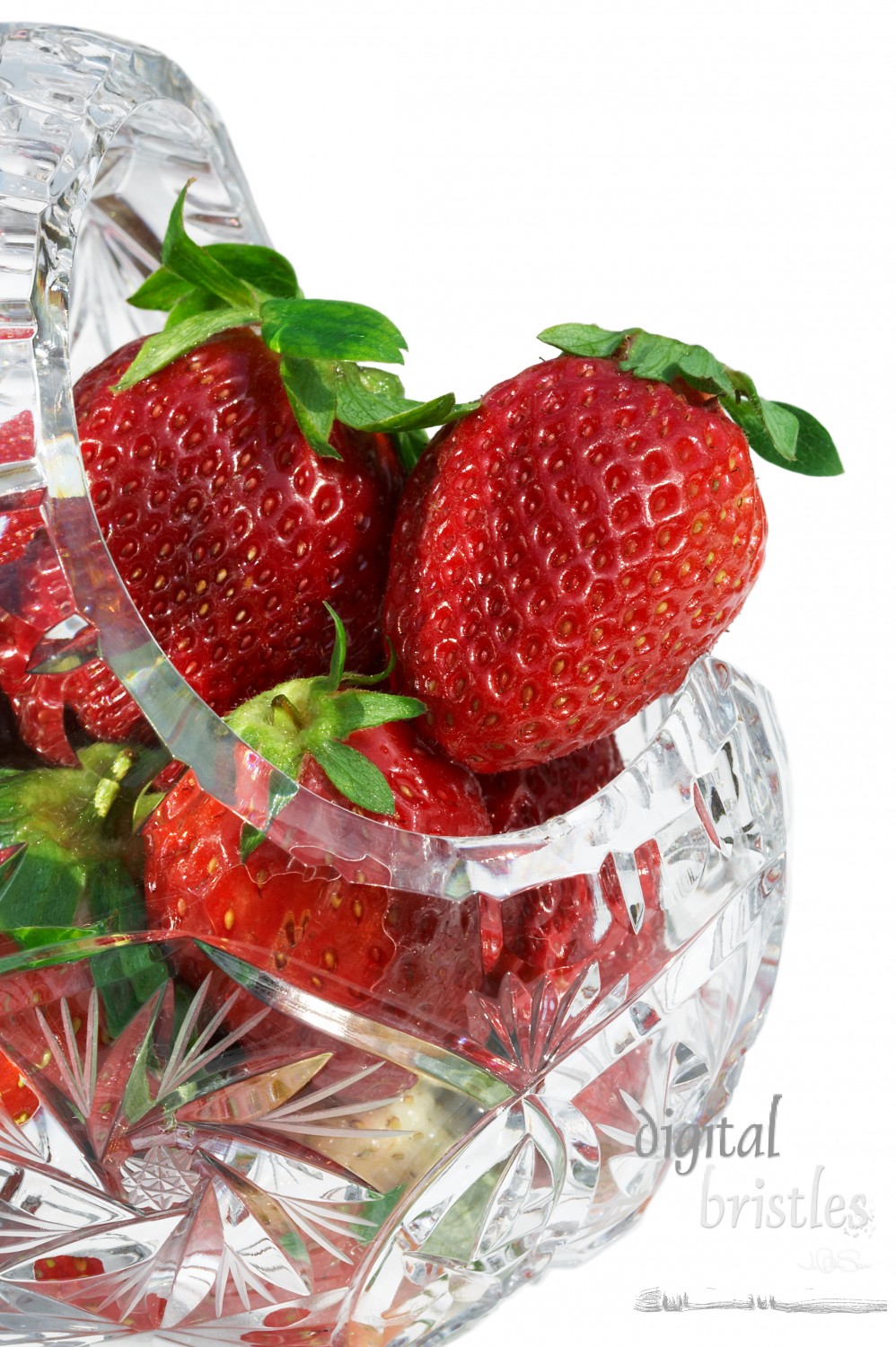 Fresh strawberries in a cut crystal basket