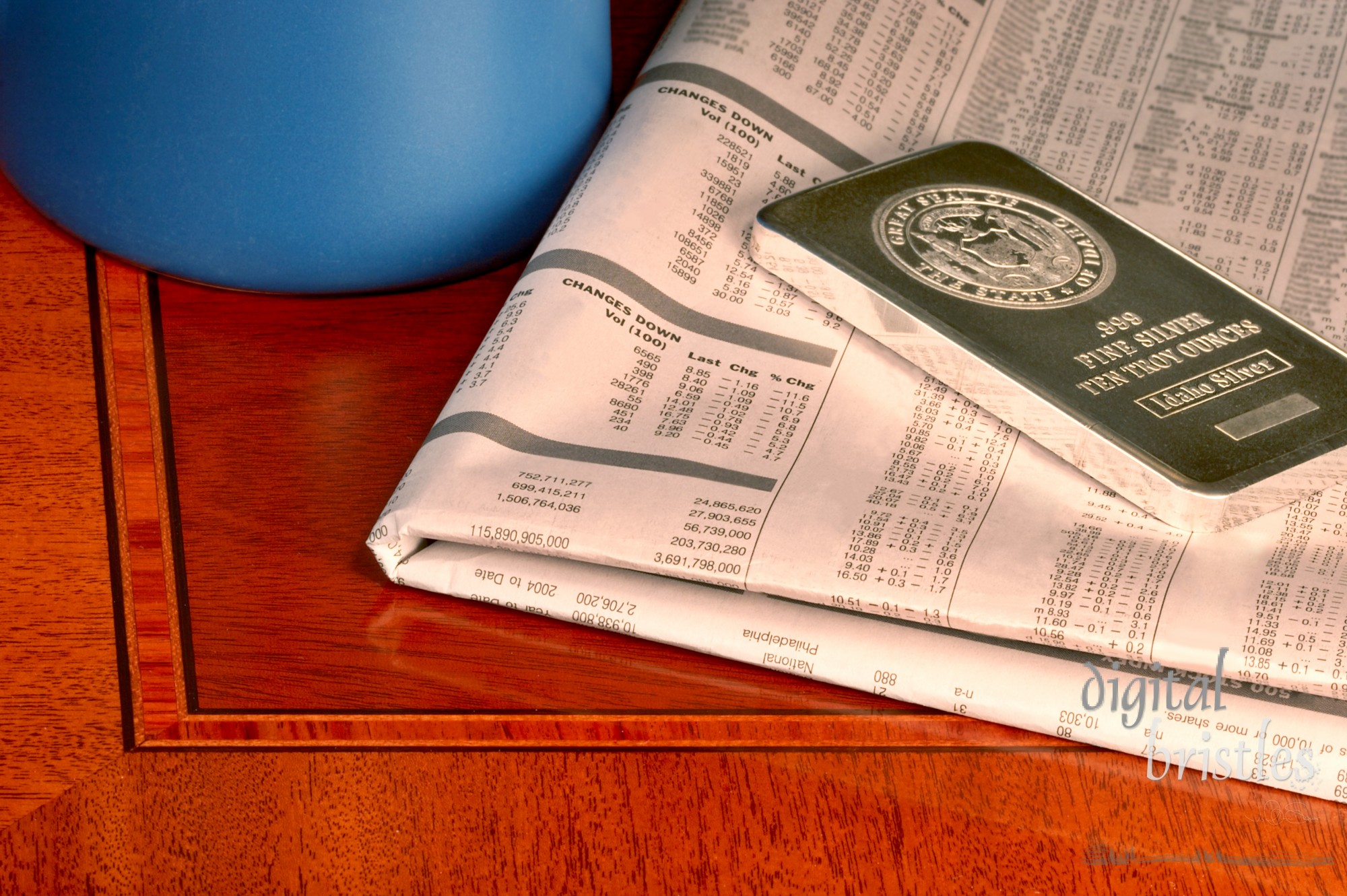 Ostentatious paperweight on financial tables on wood desk