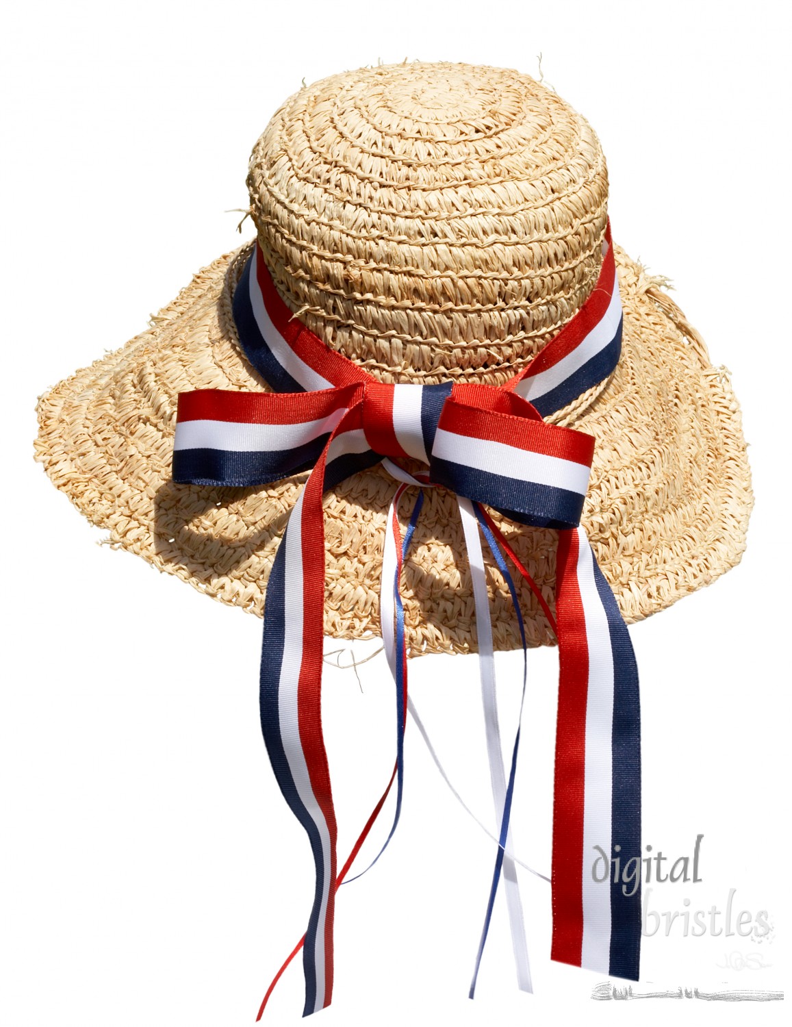 Isolated straw hat with red, white & blue ribbons