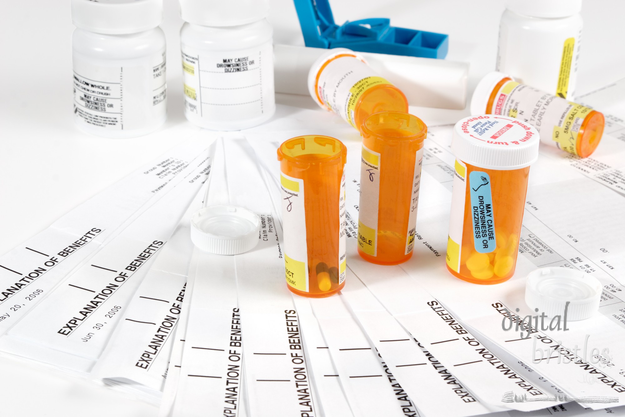 Medicine bottles, storage containers and medical insurance statements