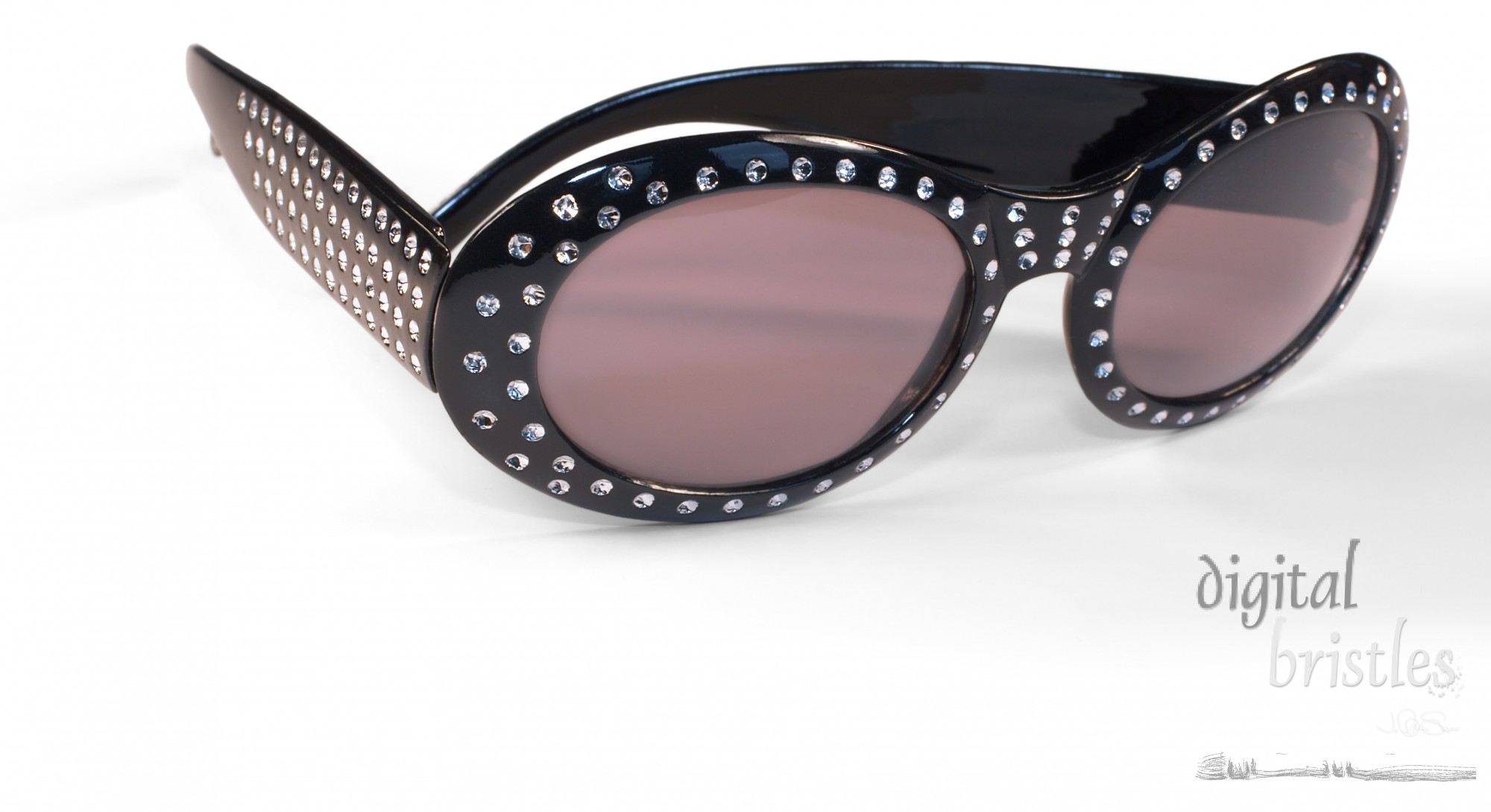 Sunglasses studded with rhinestones