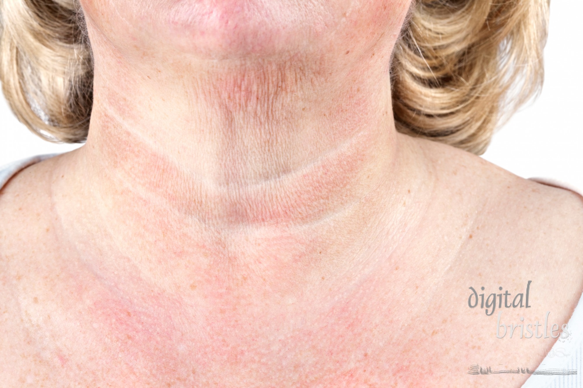 Crepe paper skin on the neck of a mature woman