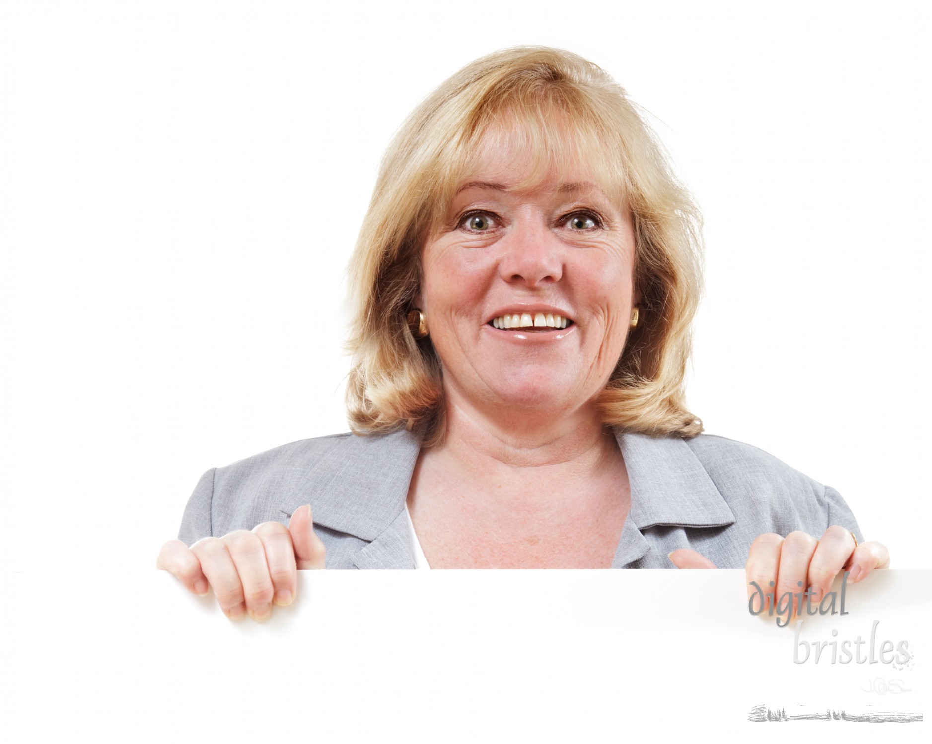 Mature woman smiles holding a blank sign