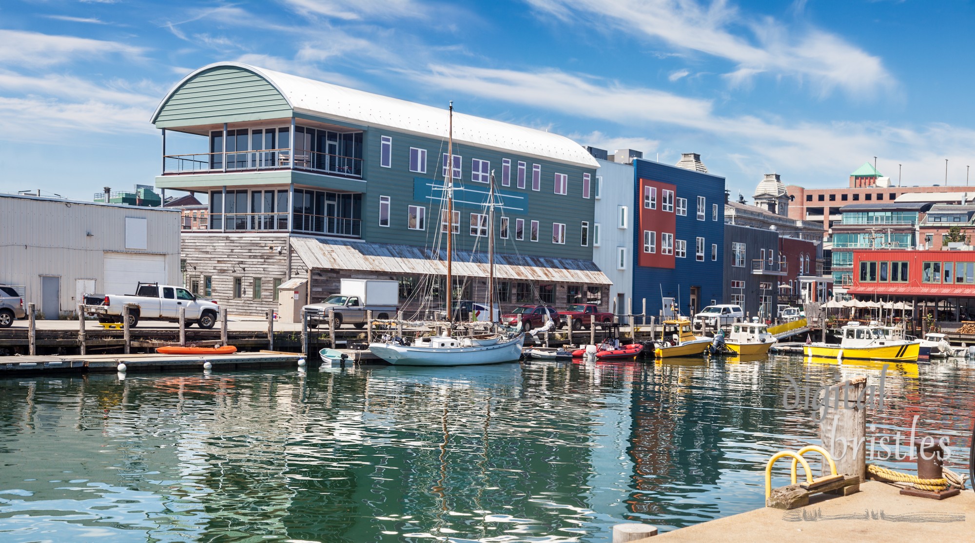 Water taxis and boats on the busy Maine Wharf, Portland, Maine