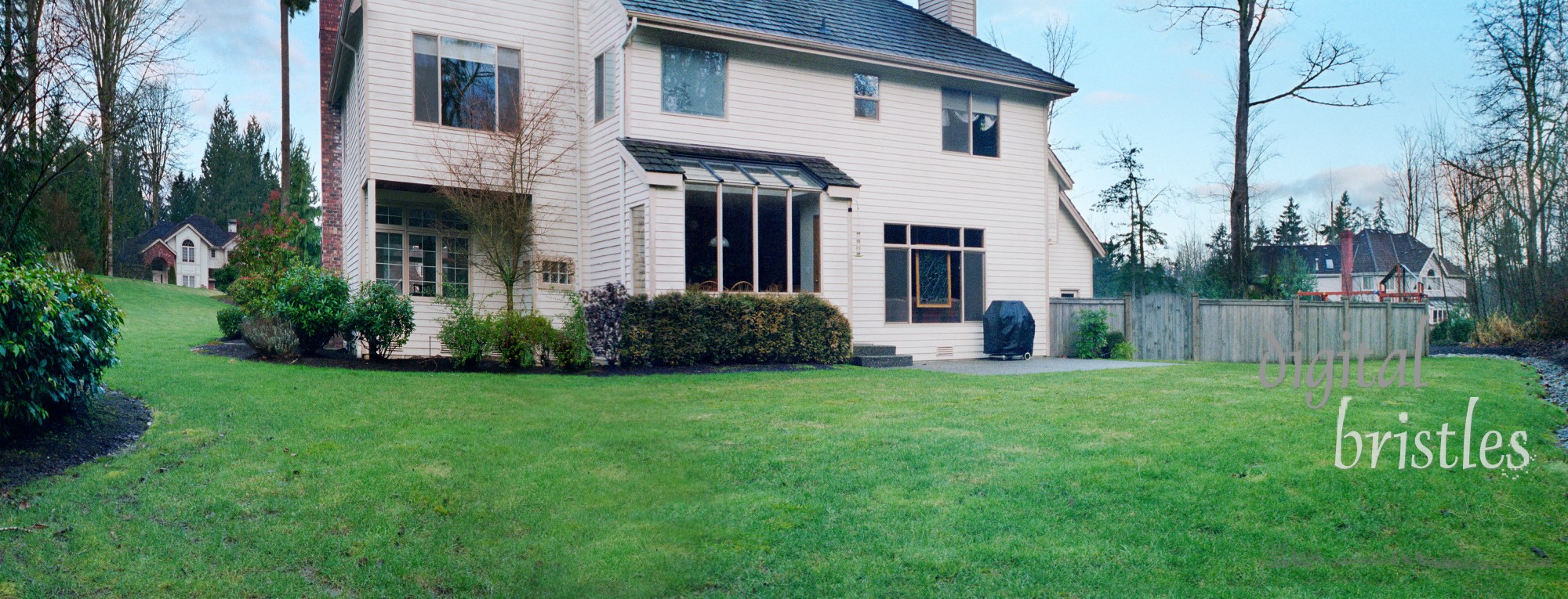 Suburban home rear view prior to starting remodeling work. Note scanned from 35mm film