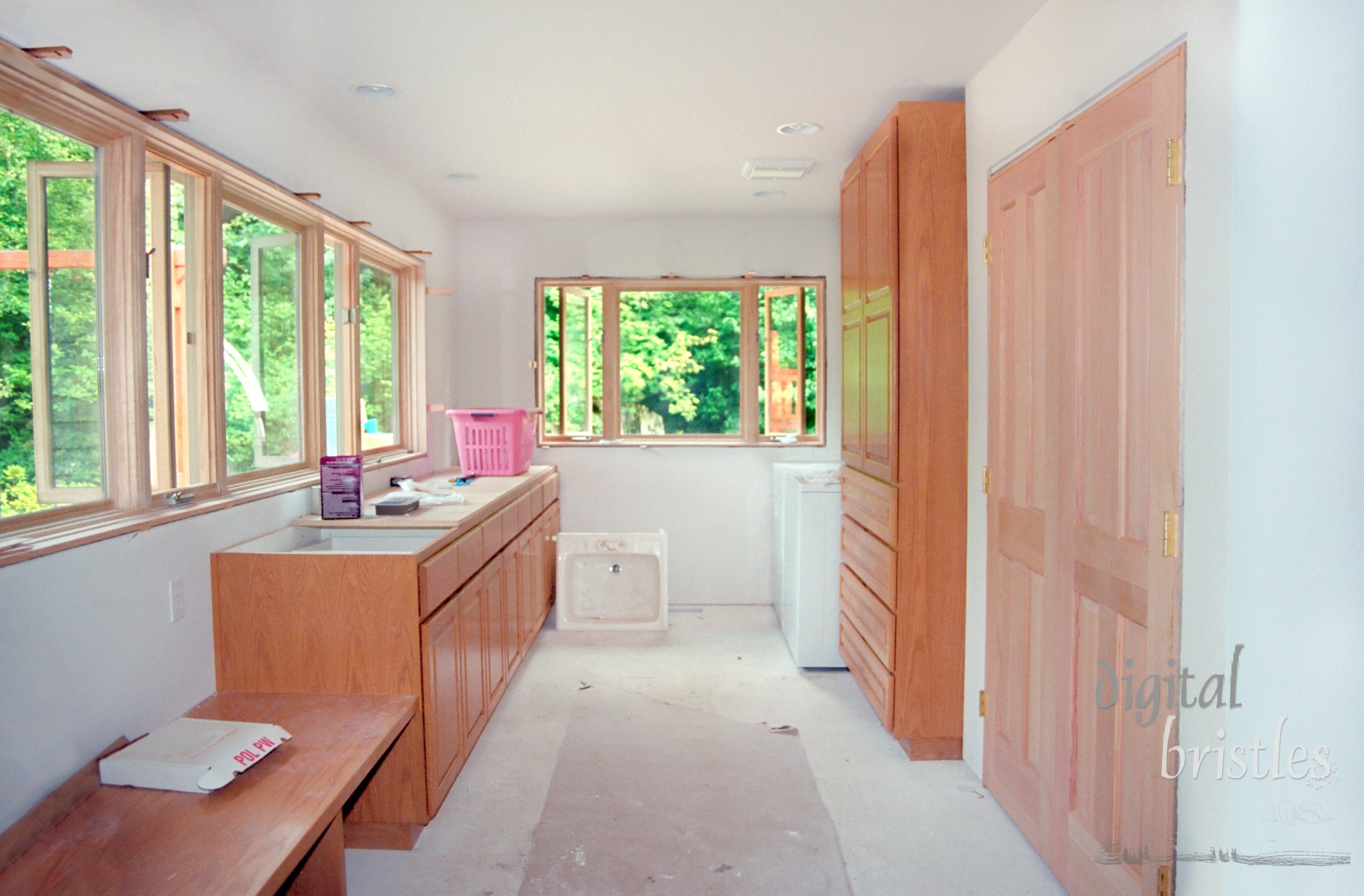 Drywall is up, windows in place & cabinet bases installed - Note scanned from 35mm film.