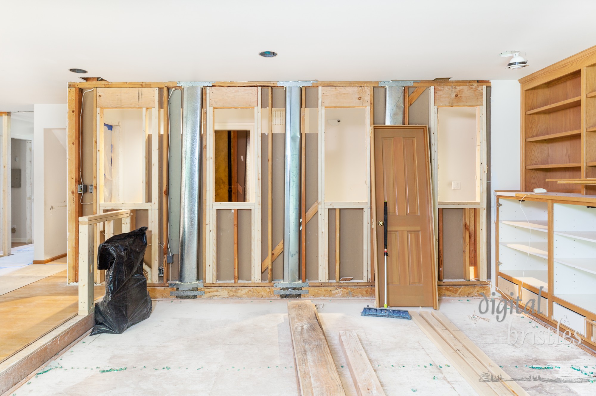 Family room wall openings and pony wall framed. Heating ducts could not be moved