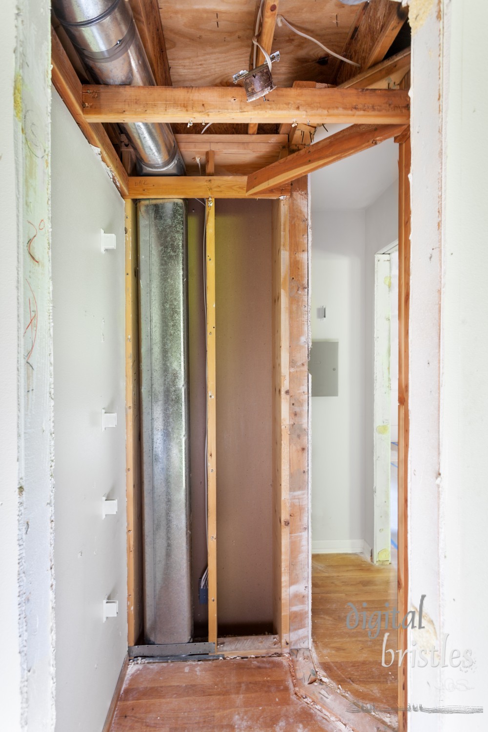 Old angled pantry wall removed in preparation for new rectangular shape