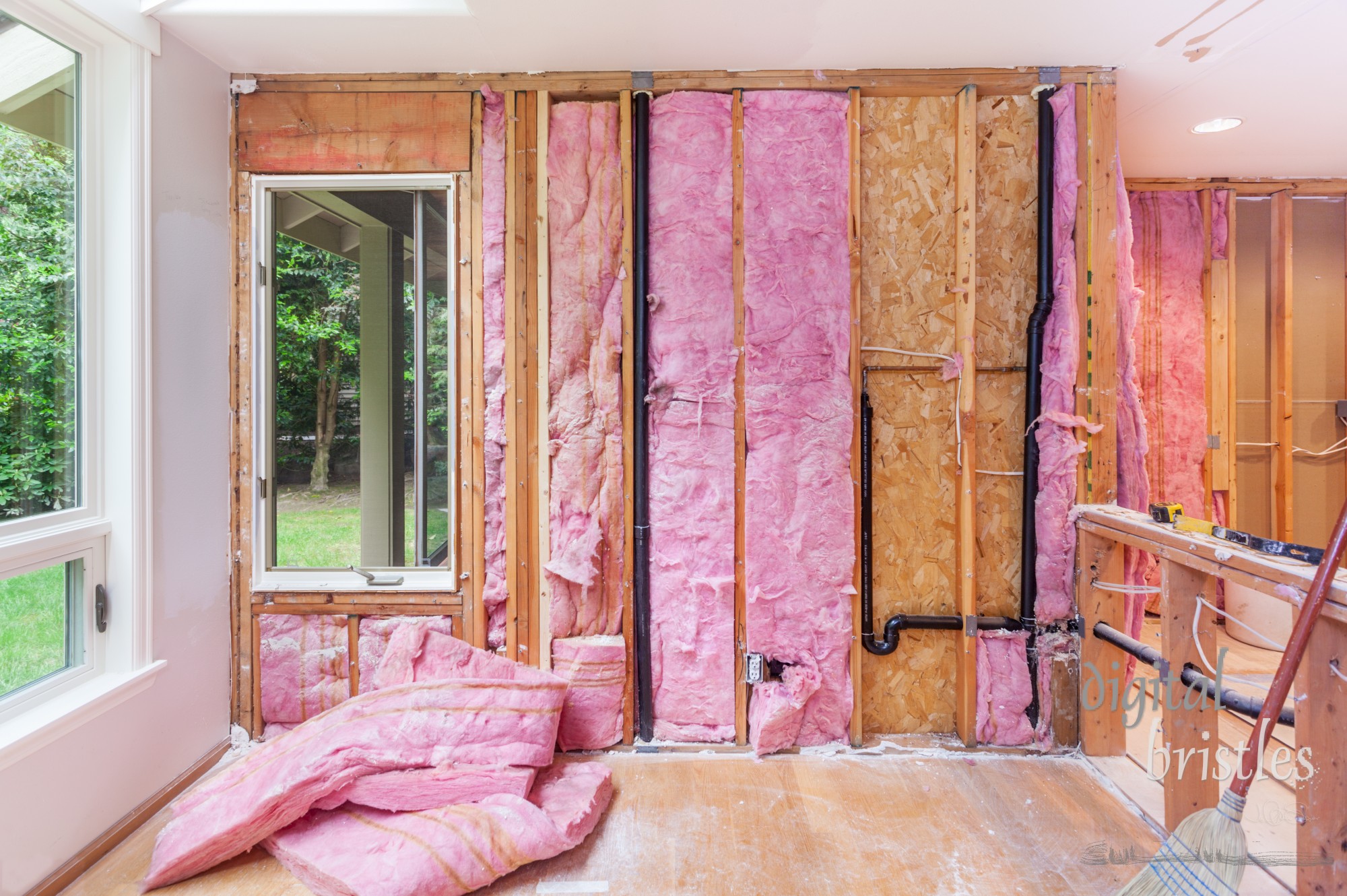 Demolishing the old kitchen - exposing the studs, existing plumbing and electrical work