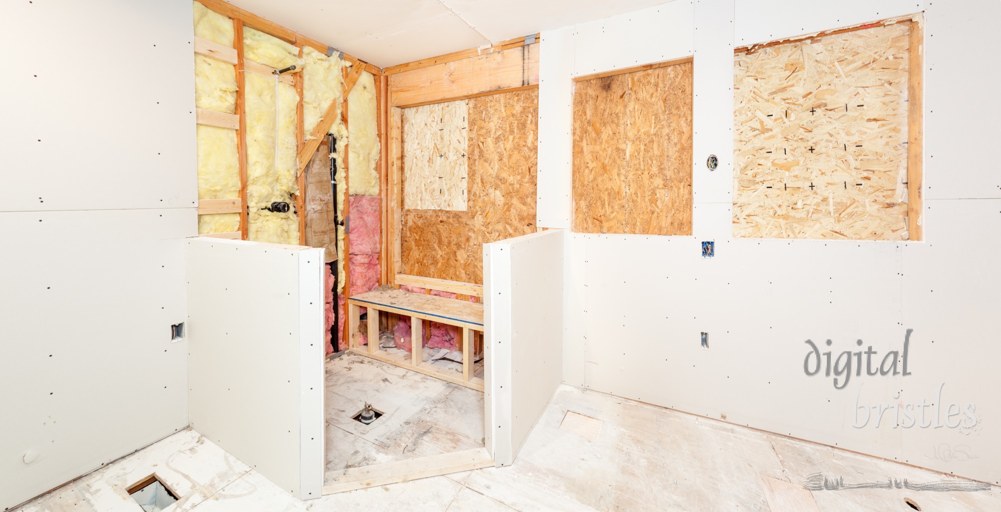 Bathroom walls and shower stall pony walls covered with drywall